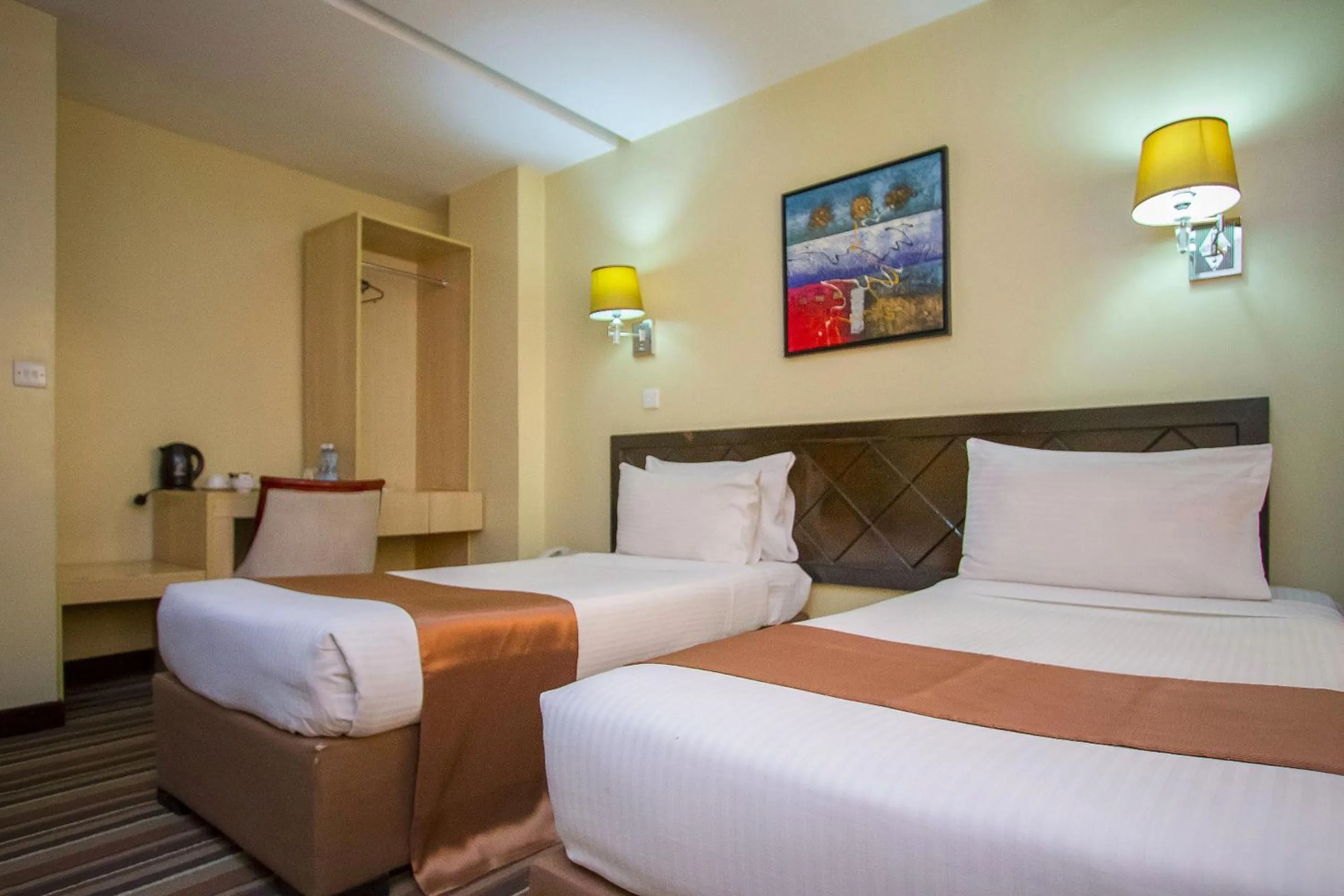 Bed in The Clarion Hotel