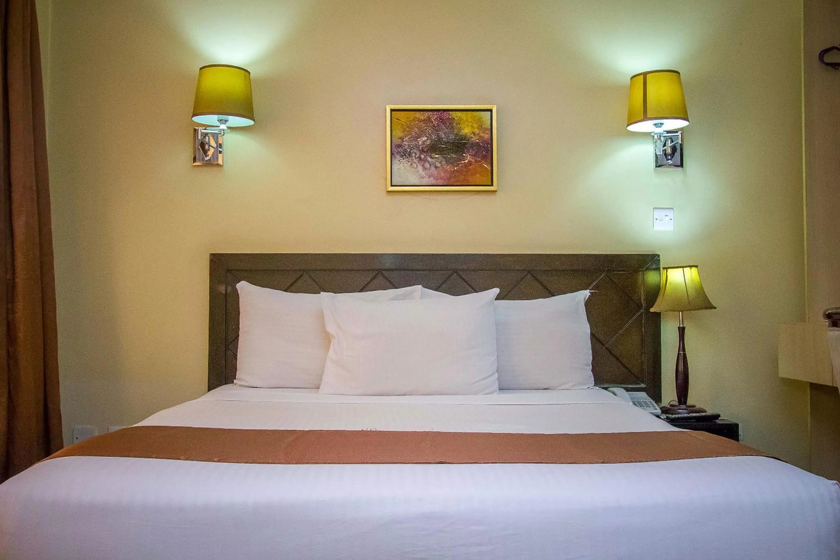 Bed in The Clarion Hotel