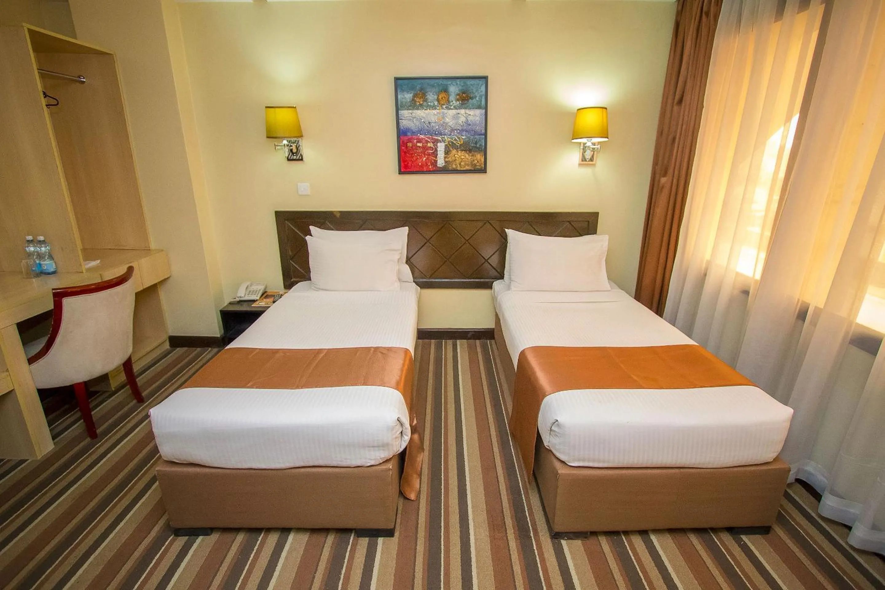 Bed in The Clarion Hotel