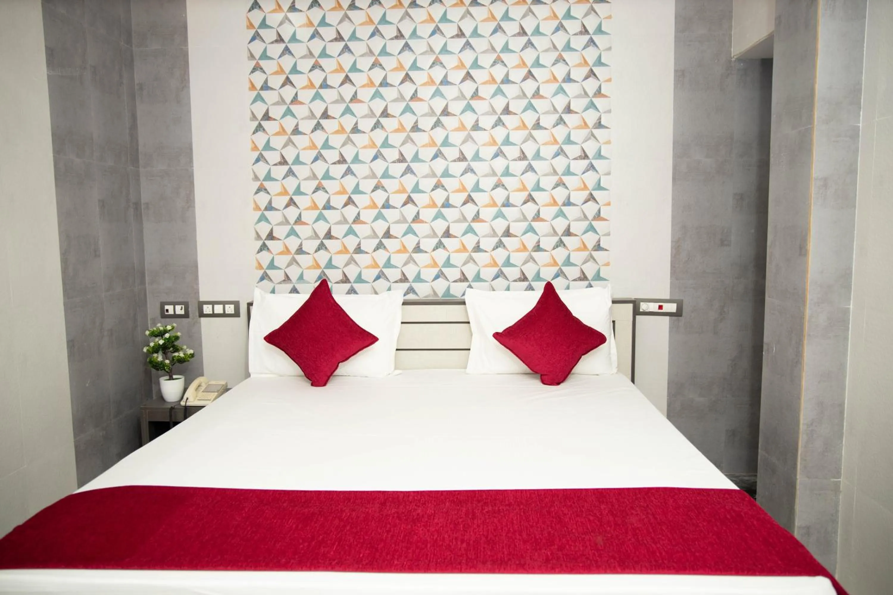 Bed in Hotel Ganesh Palace