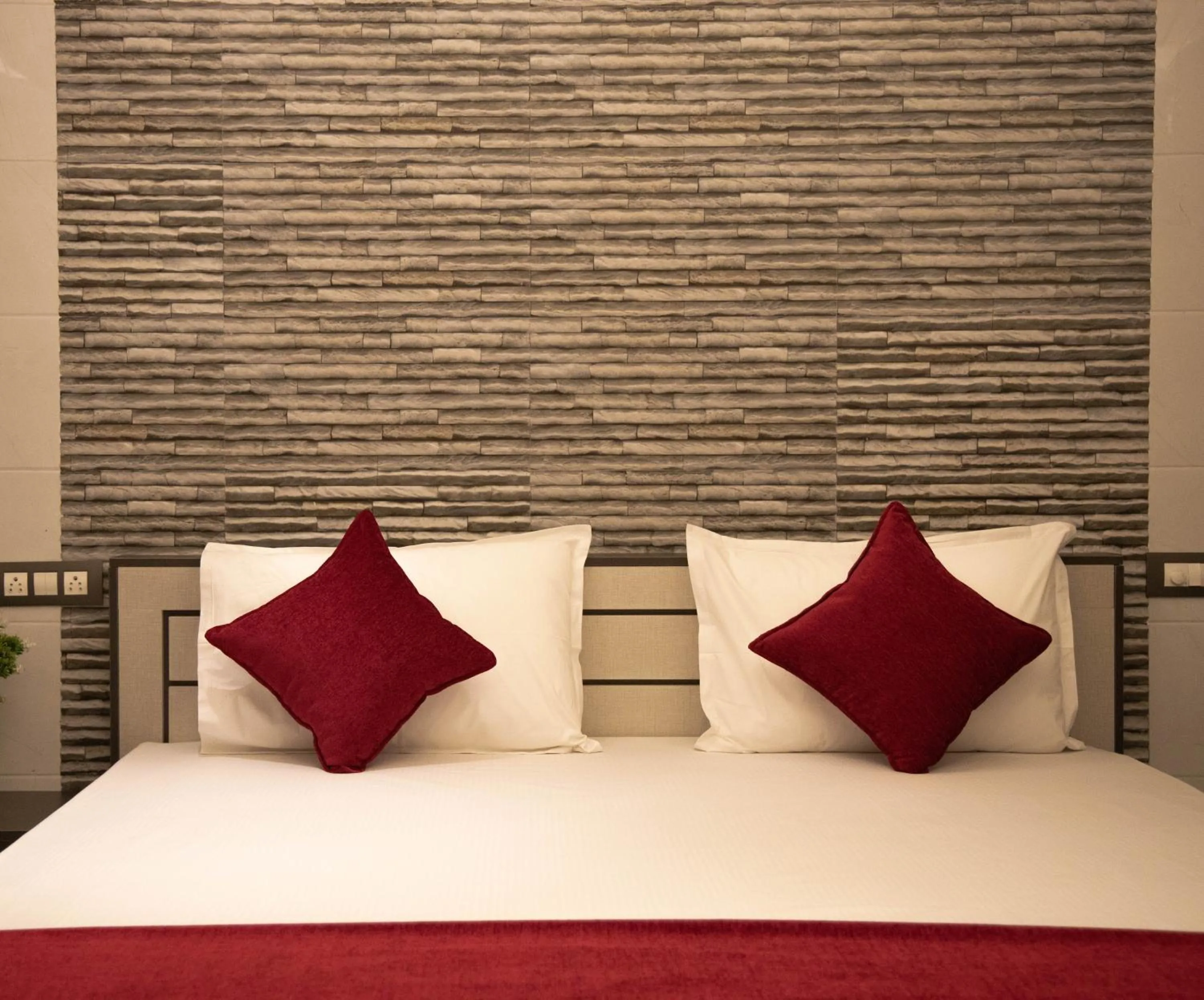 Bed in Hotel Ganesh Palace