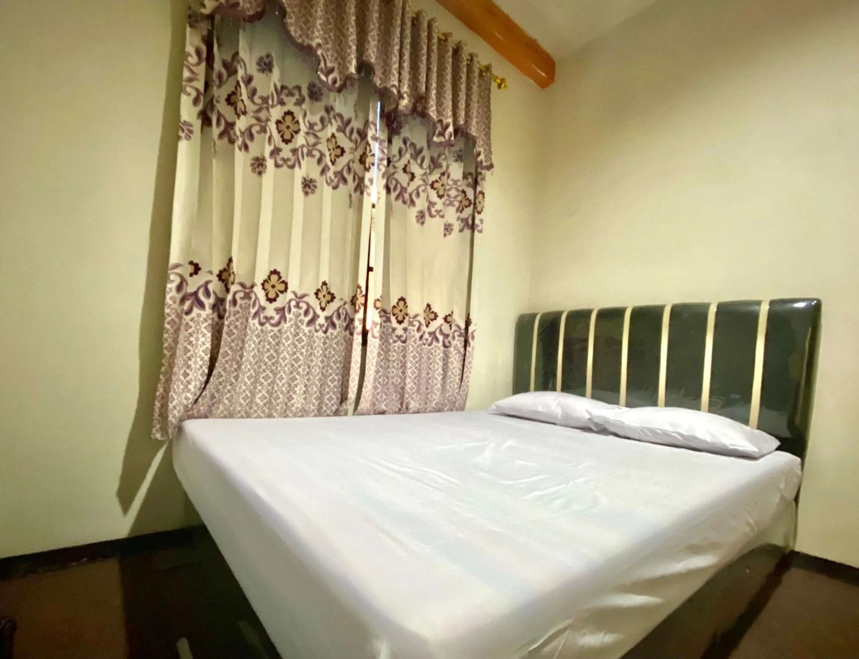 Bed in Homestay Srikandi Syariah Dieng RedPartner