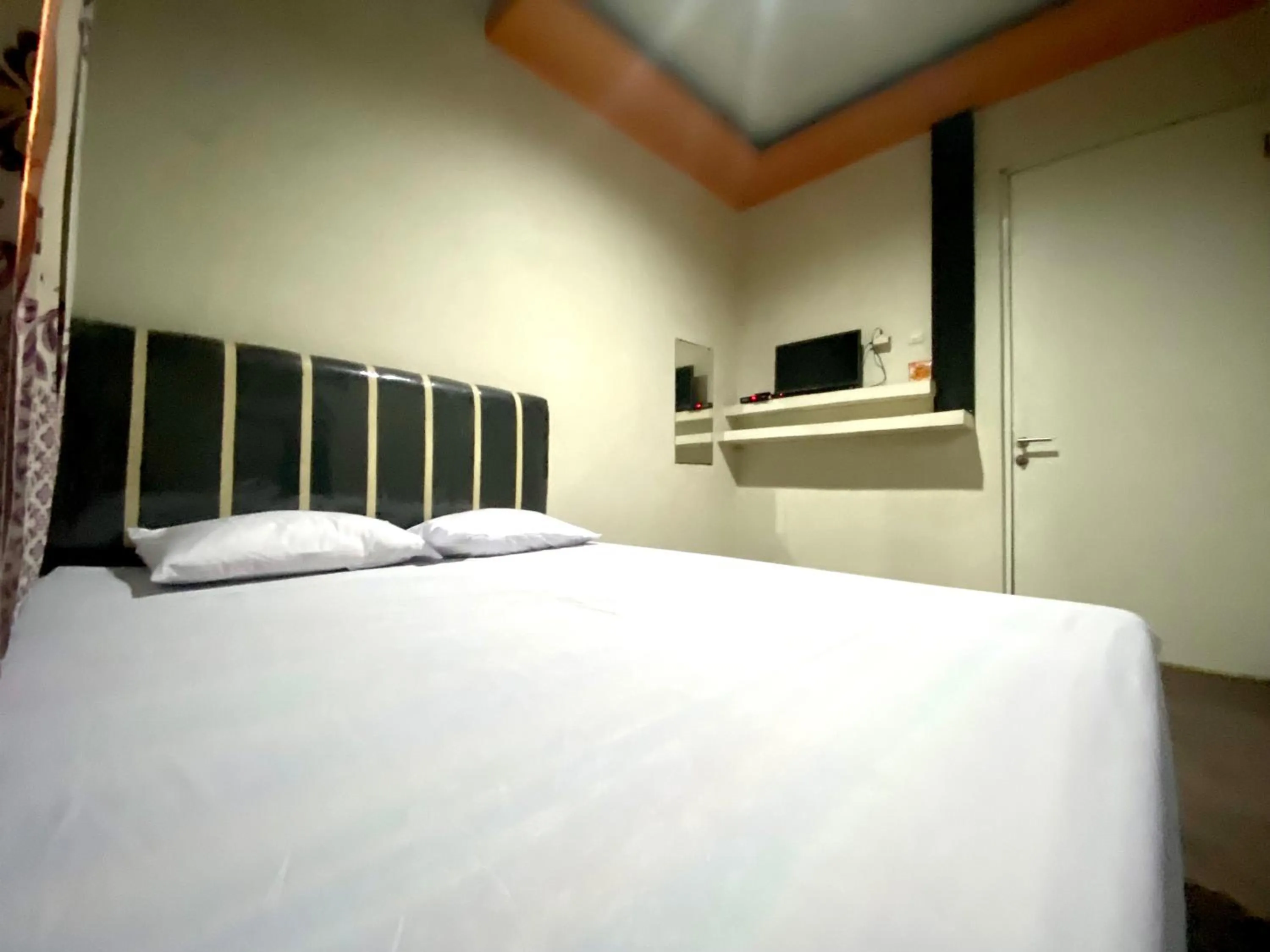 Bed in Homestay Srikandi Syariah Dieng RedPartner