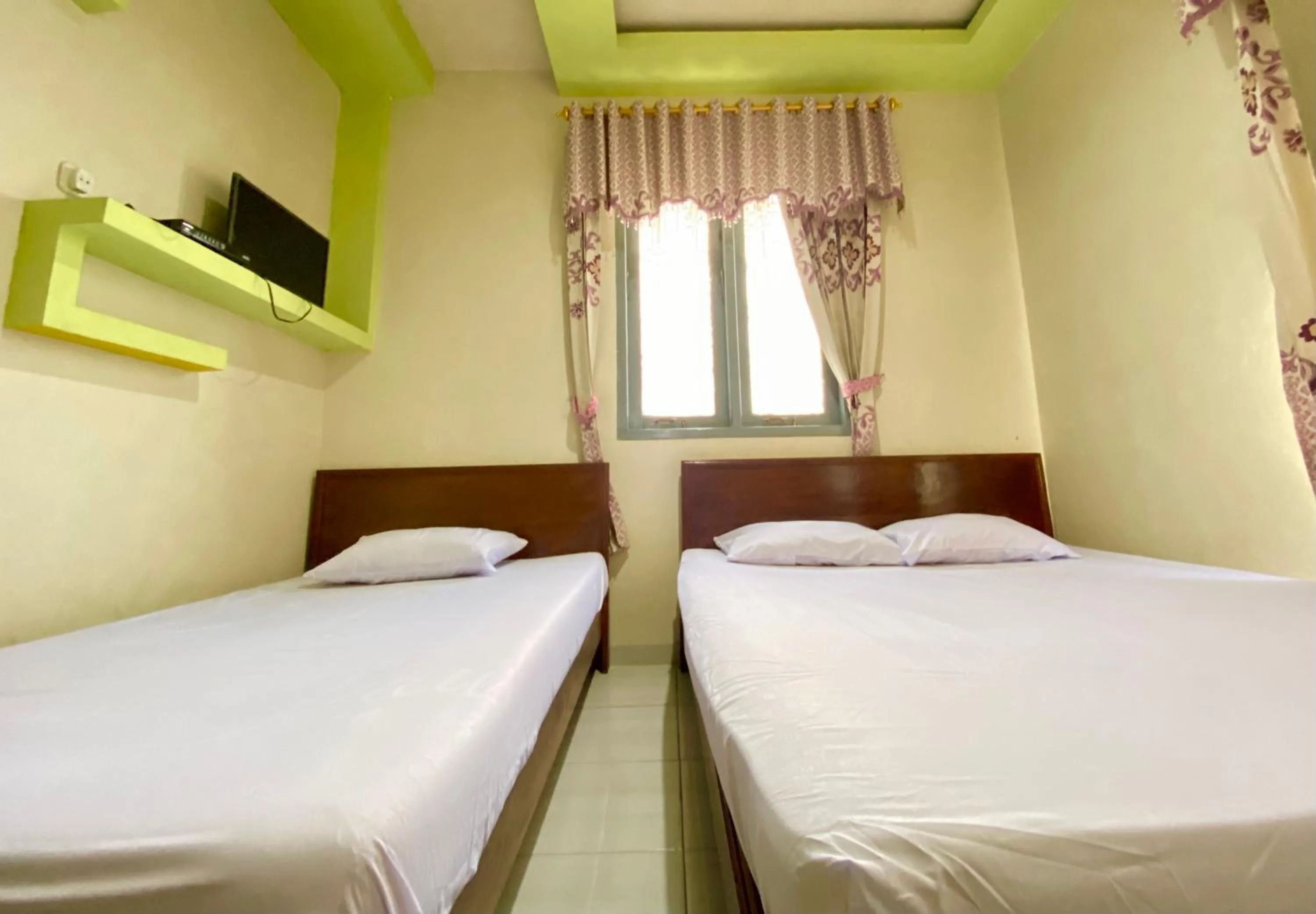 Bed in Homestay Srikandi Syariah Dieng RedPartner