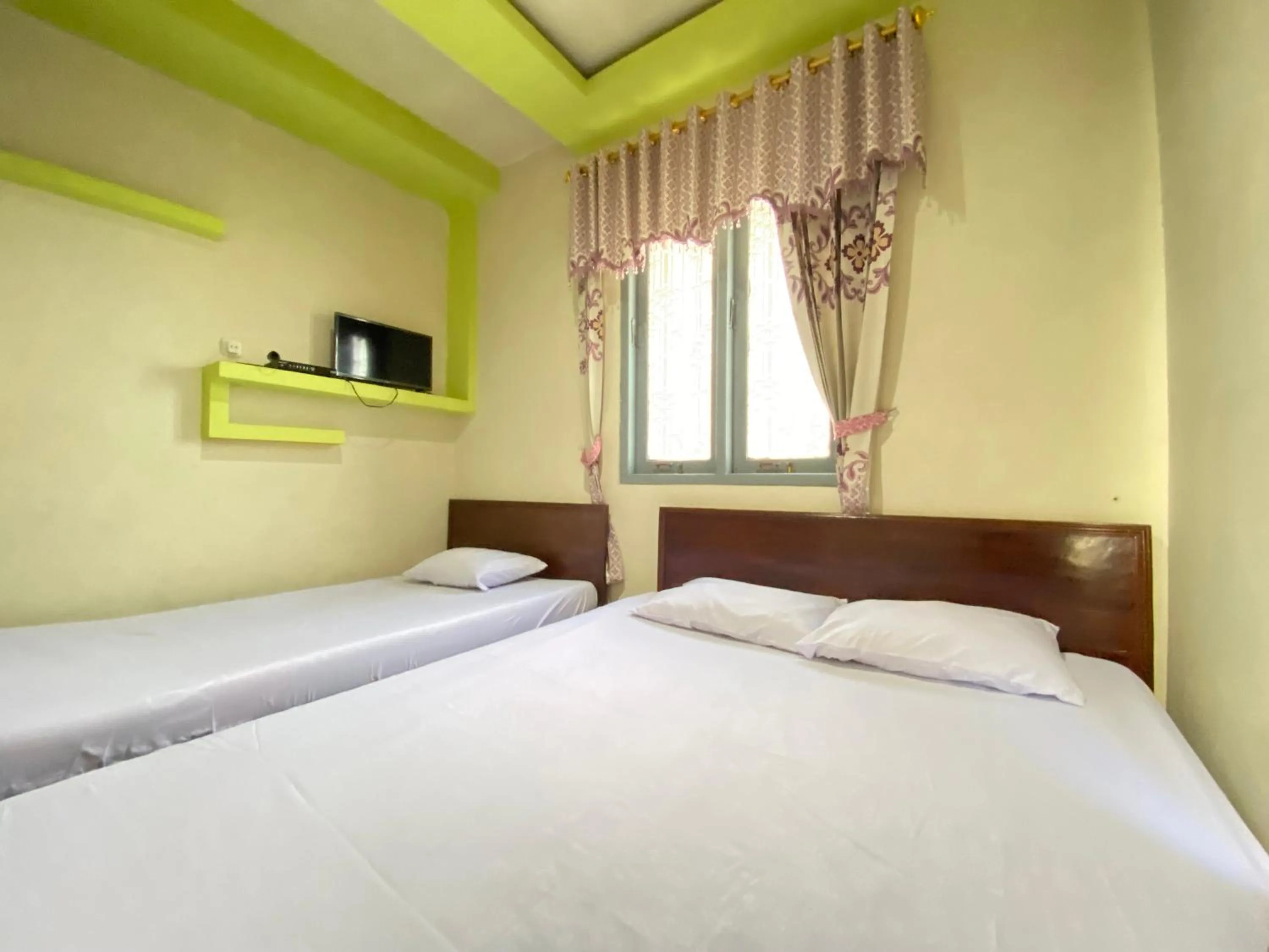 Bed in Homestay Srikandi Syariah Dieng RedPartner