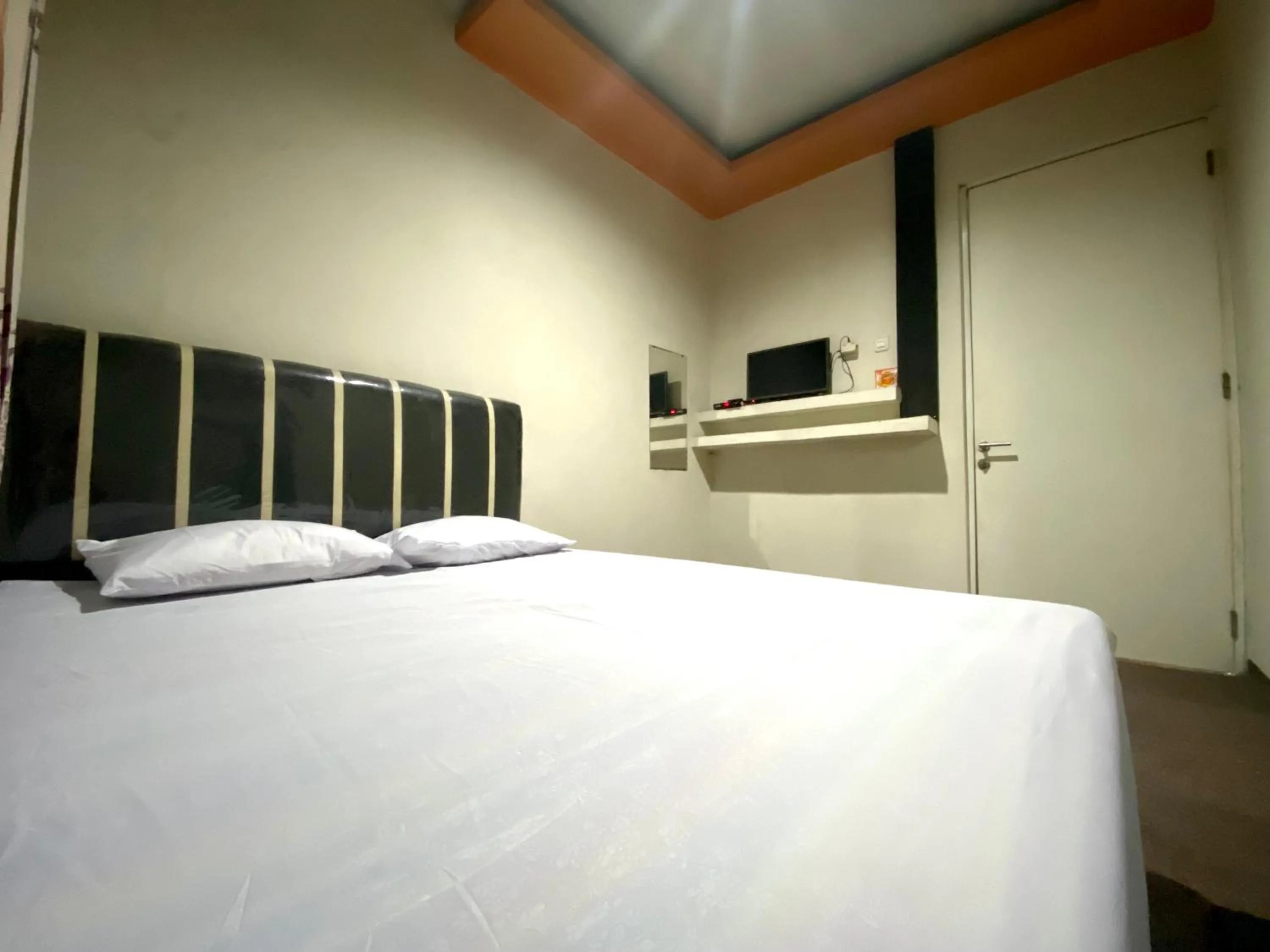 Bed in Homestay Srikandi Syariah Dieng RedPartner