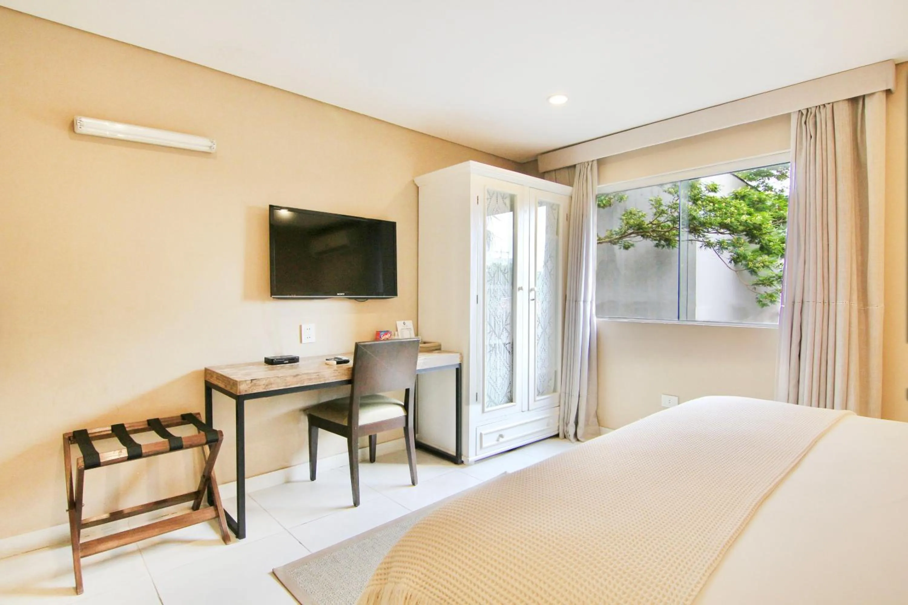 Bed in Faro Norte Suites