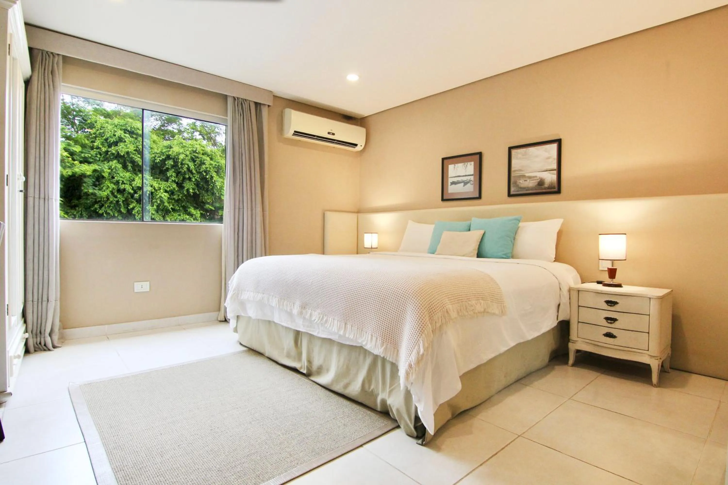 Bed in Faro Norte Suites