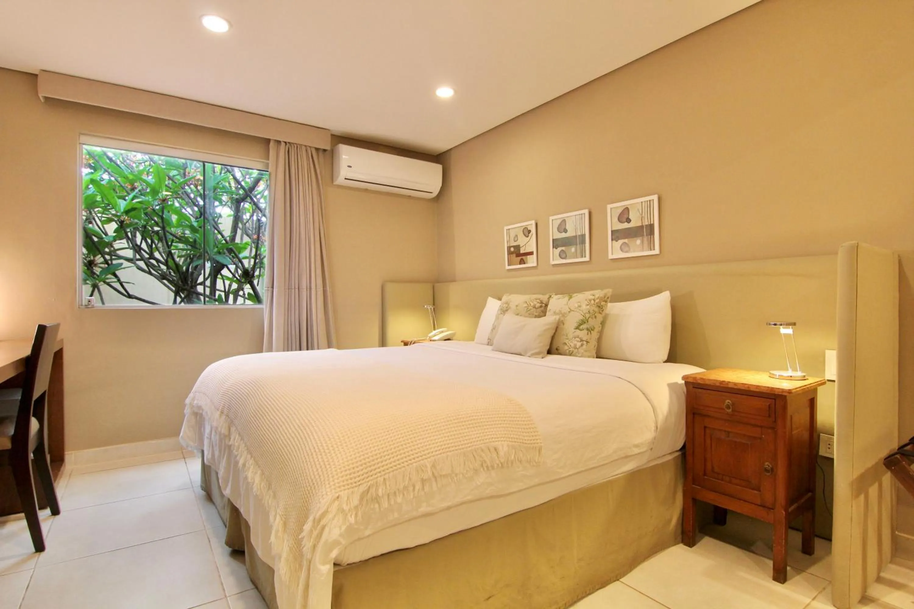 Bed in Faro Norte Suites