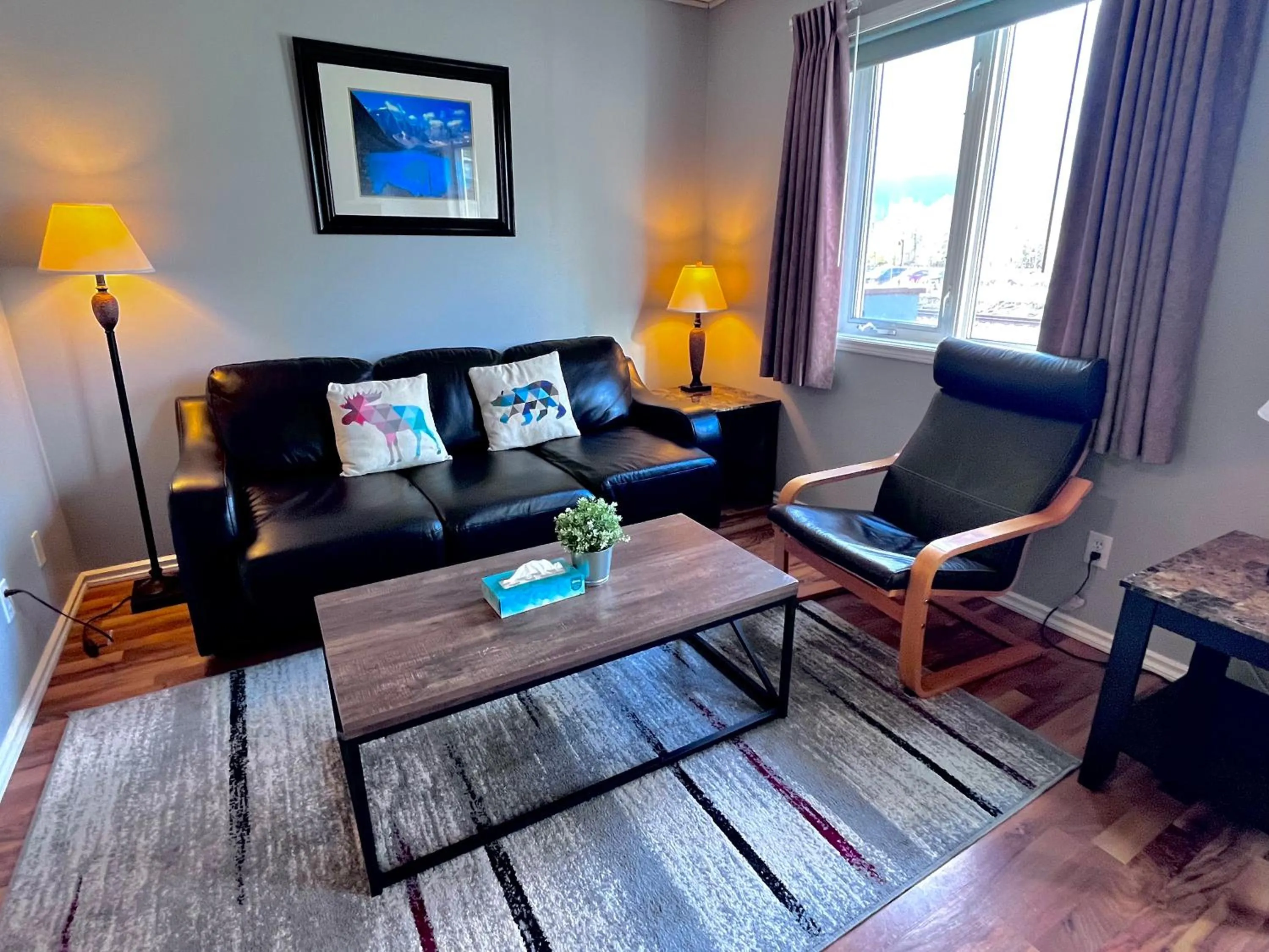 Living room in Canadian Rockies Chalets by Trilink - 2 & 3 Bedroom Condos - Self Check-In - Walking Distance to Downtown - Free Parking - Pet-Friendly - No AC
