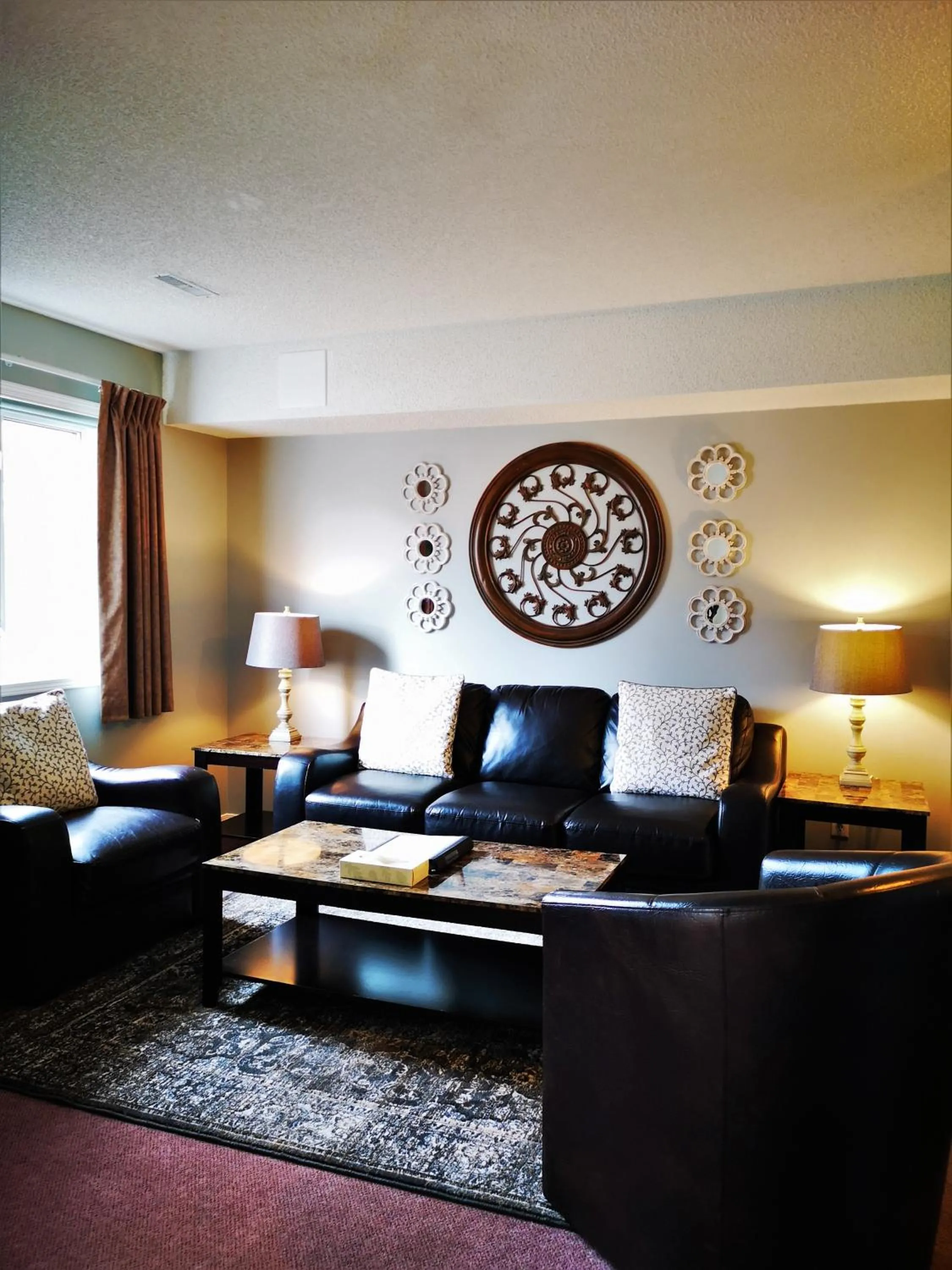 Living room in Canadian Rockies Chalets by Trilink - 2 & 3 Bedroom Condos - Self Check-In - Walking Distance to Downtown - Free Parking - Pet-Friendly - No AC