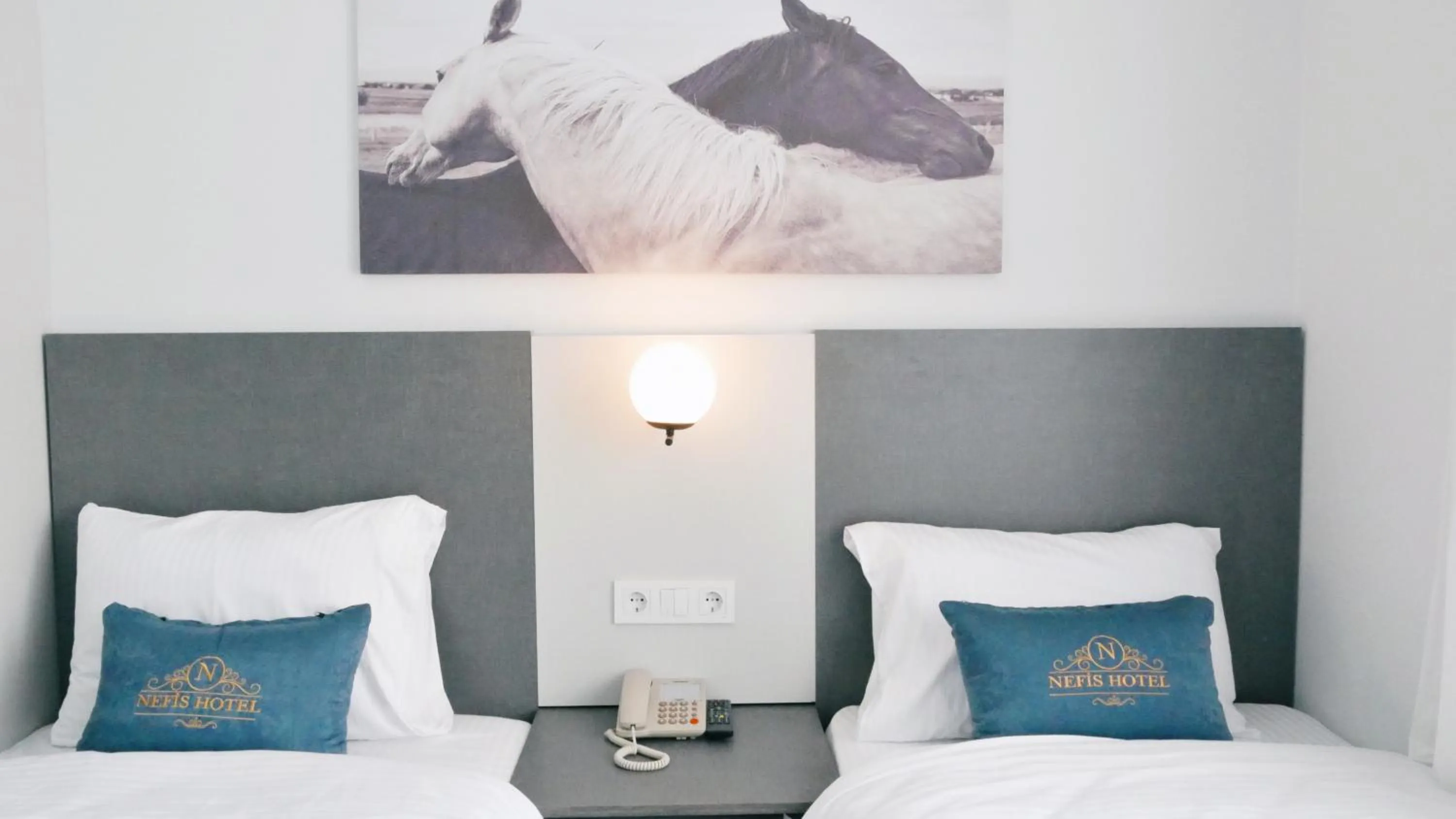 Bed in Nefis Hotel City