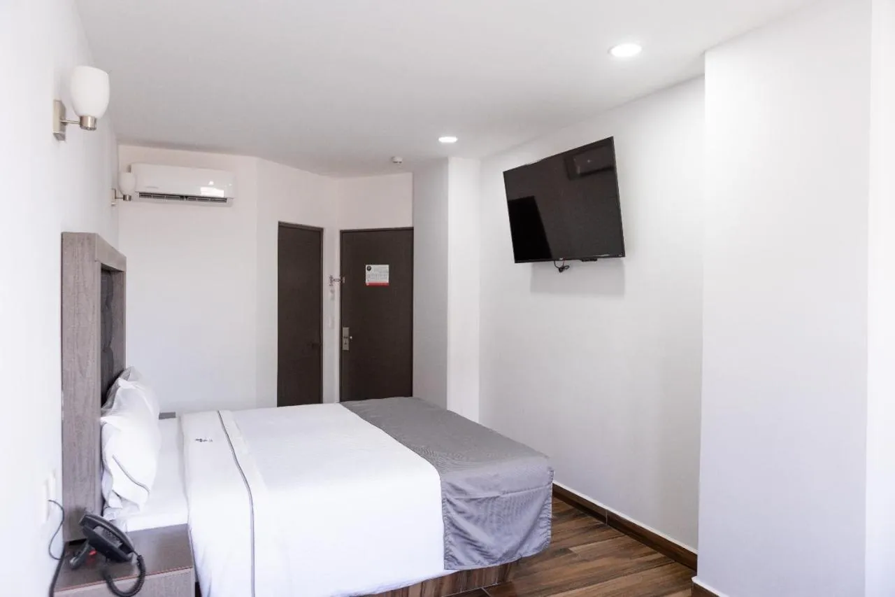 Bed in Hotel Bugari Aeropuerto Guadalajara