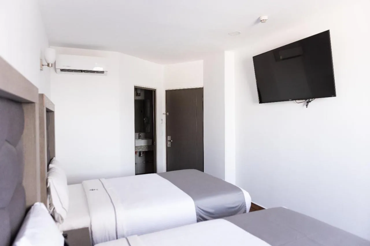 Bed in Hotel Bugari Aeropuerto Guadalajara