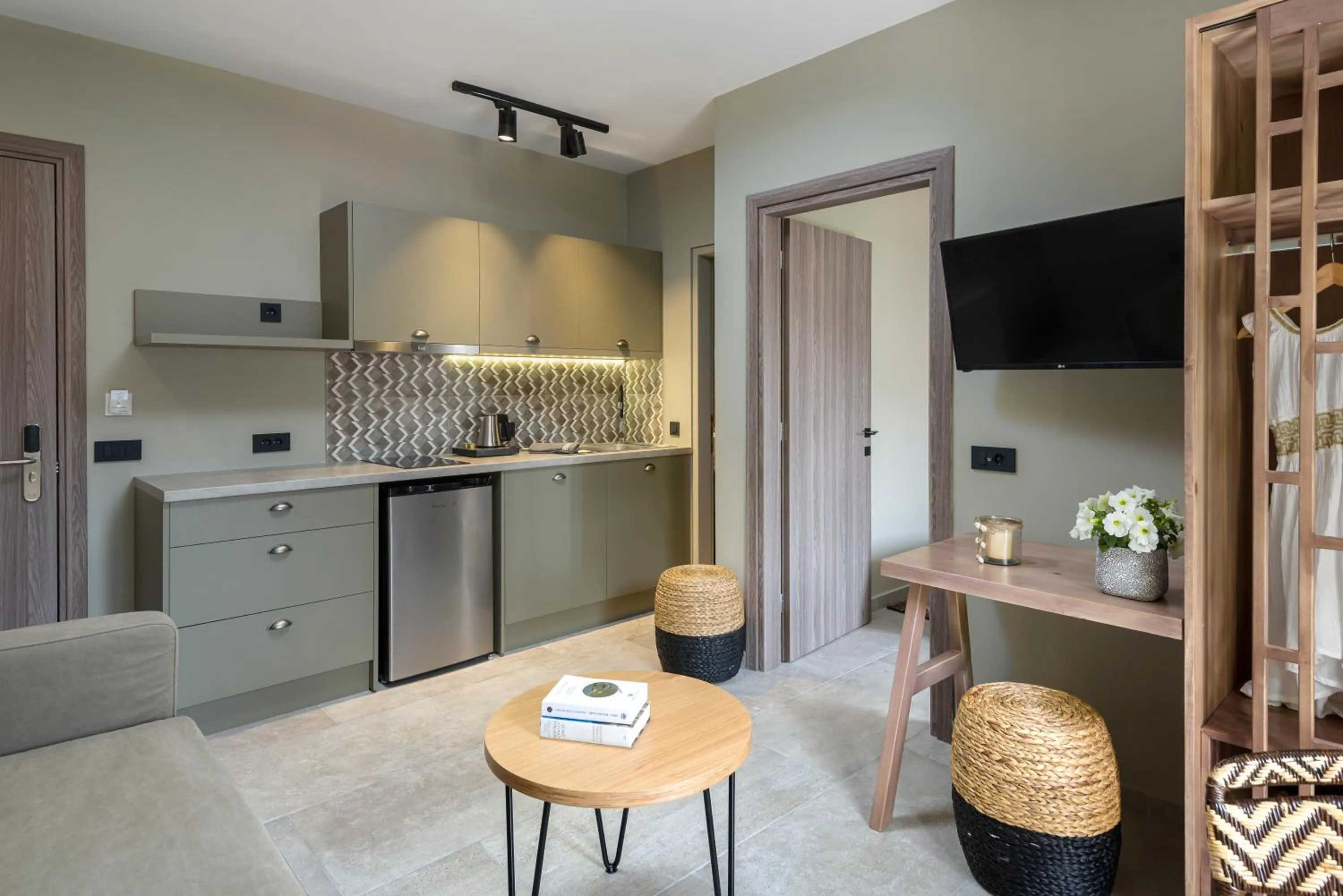 Kitchen or kitchenette in Oasis Apartments