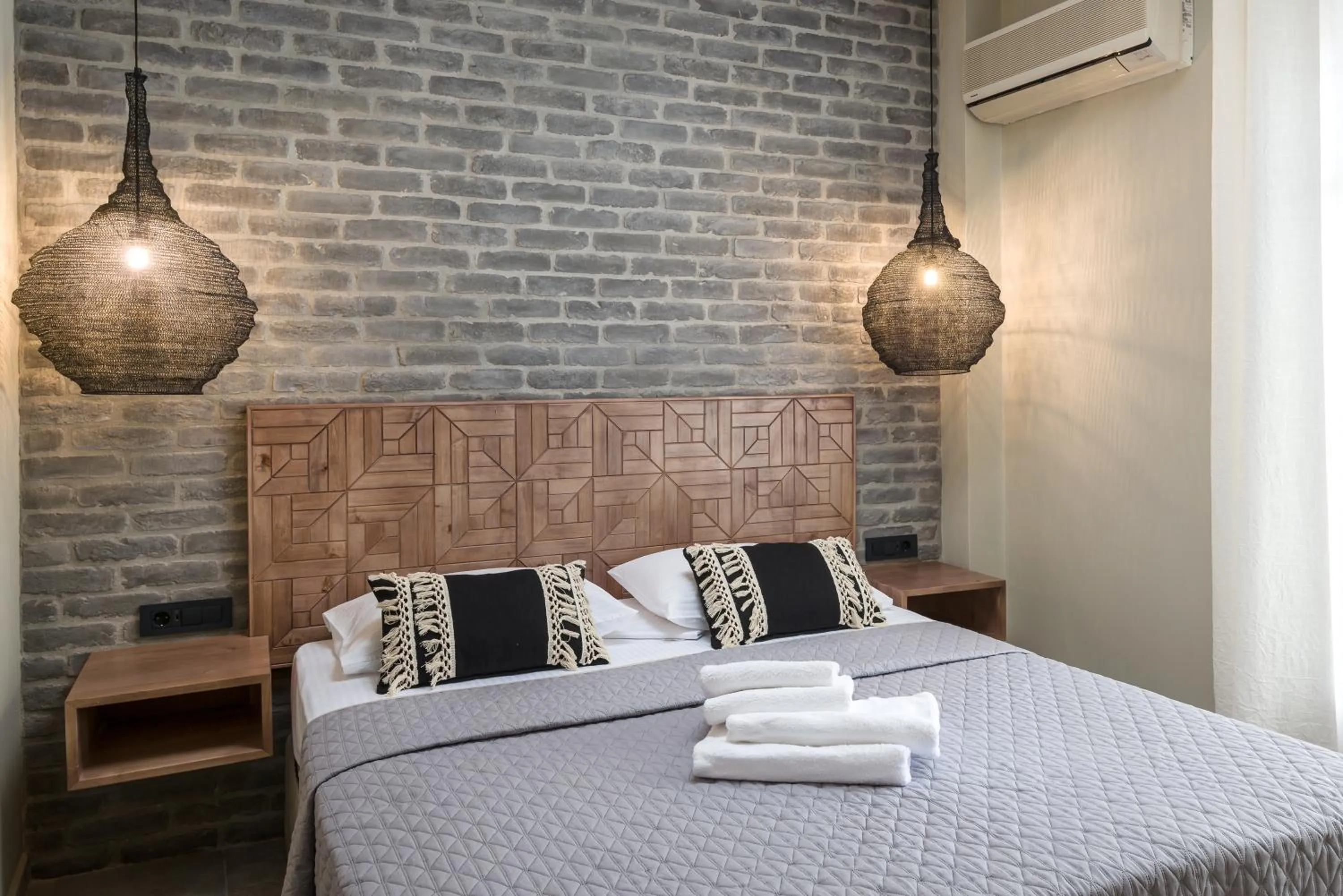 Bed in Oasis Apartments