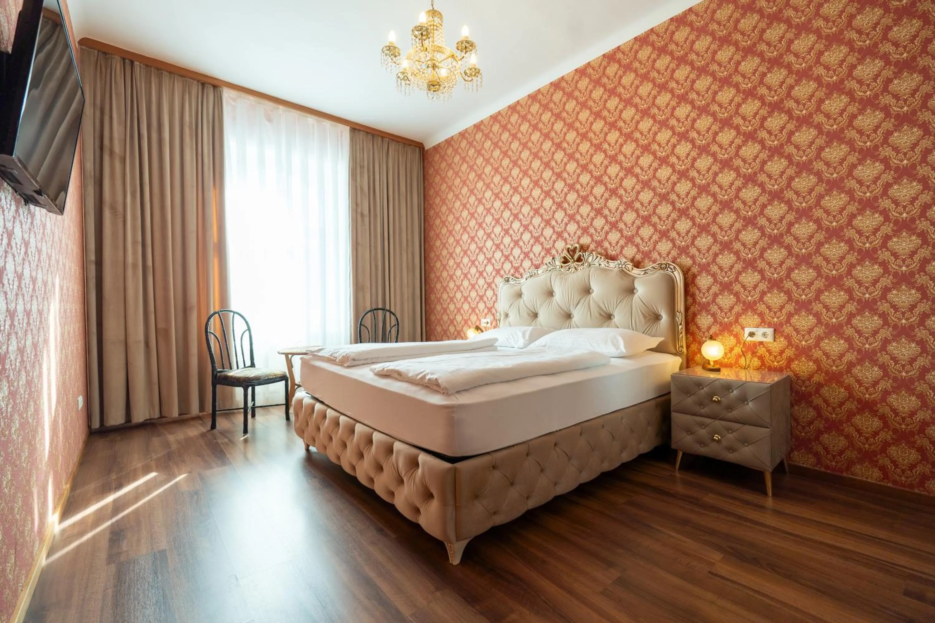 Bed in Hotel Urania
