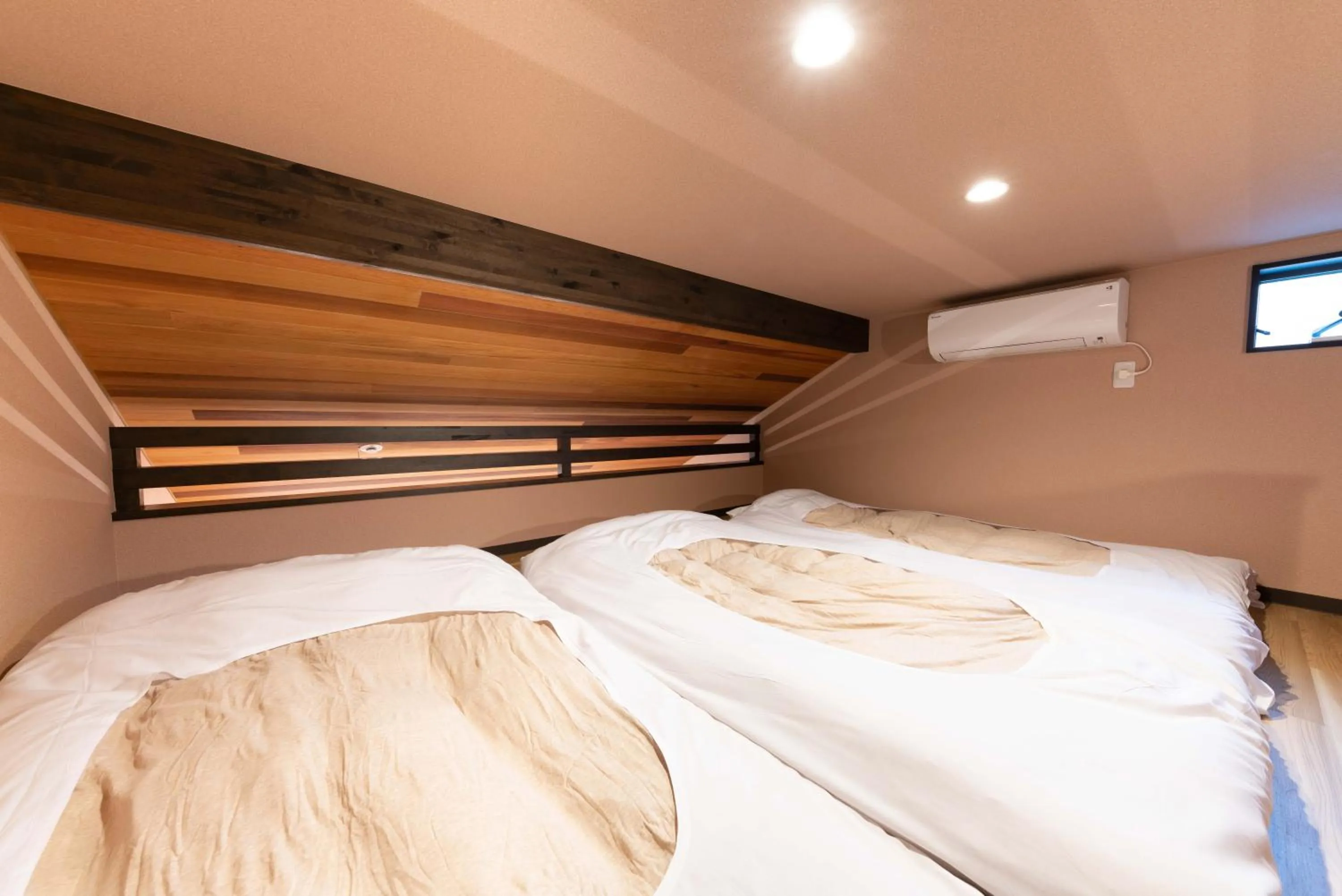 Bed in SYLA HOTEL 箱根強羅 West - SYLA HOTEL HAKONE GORA West