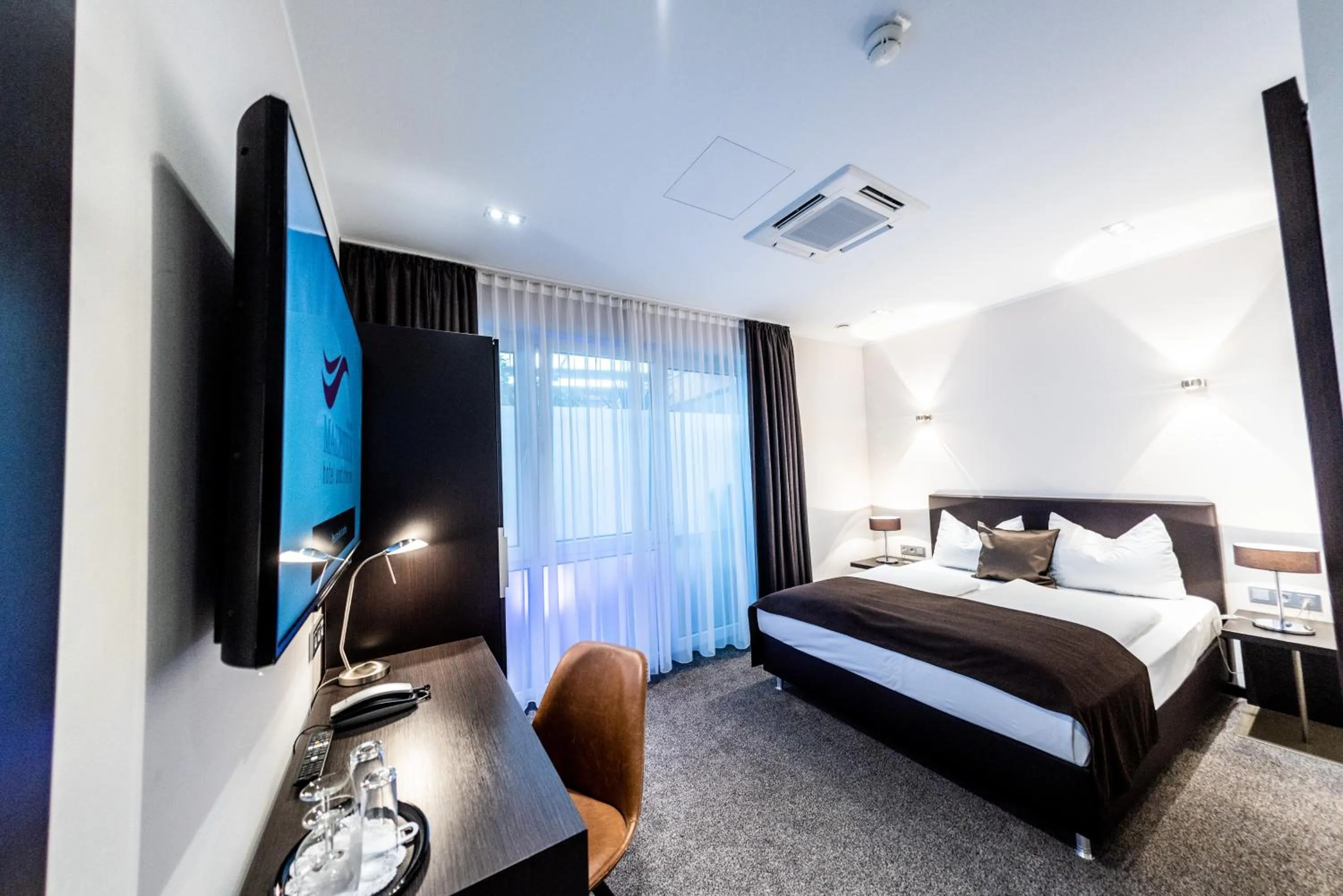 Photo of the whole room, Bed in Mauritius Hotel & Therme