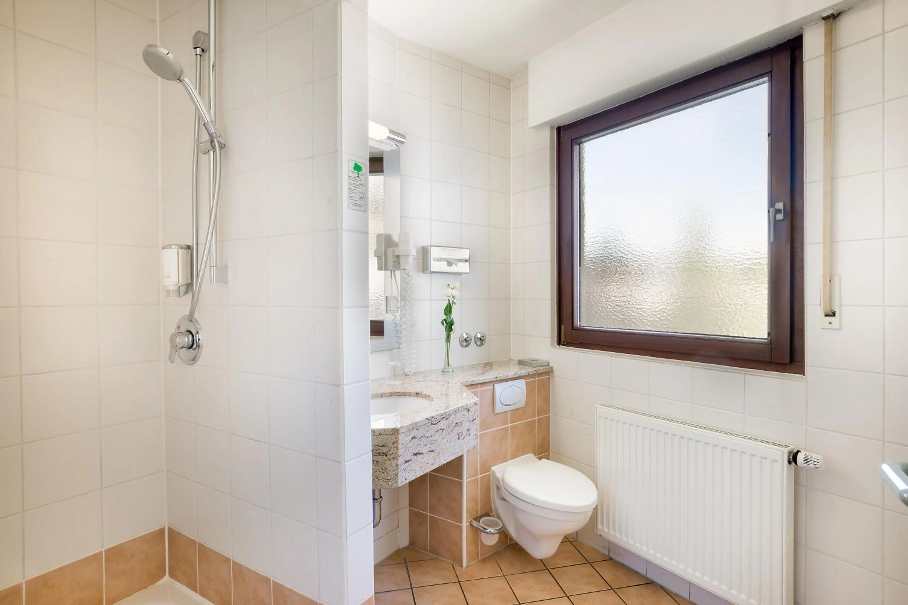 Bathroom in Garner Hotel Stuttgart City Centre by IHG