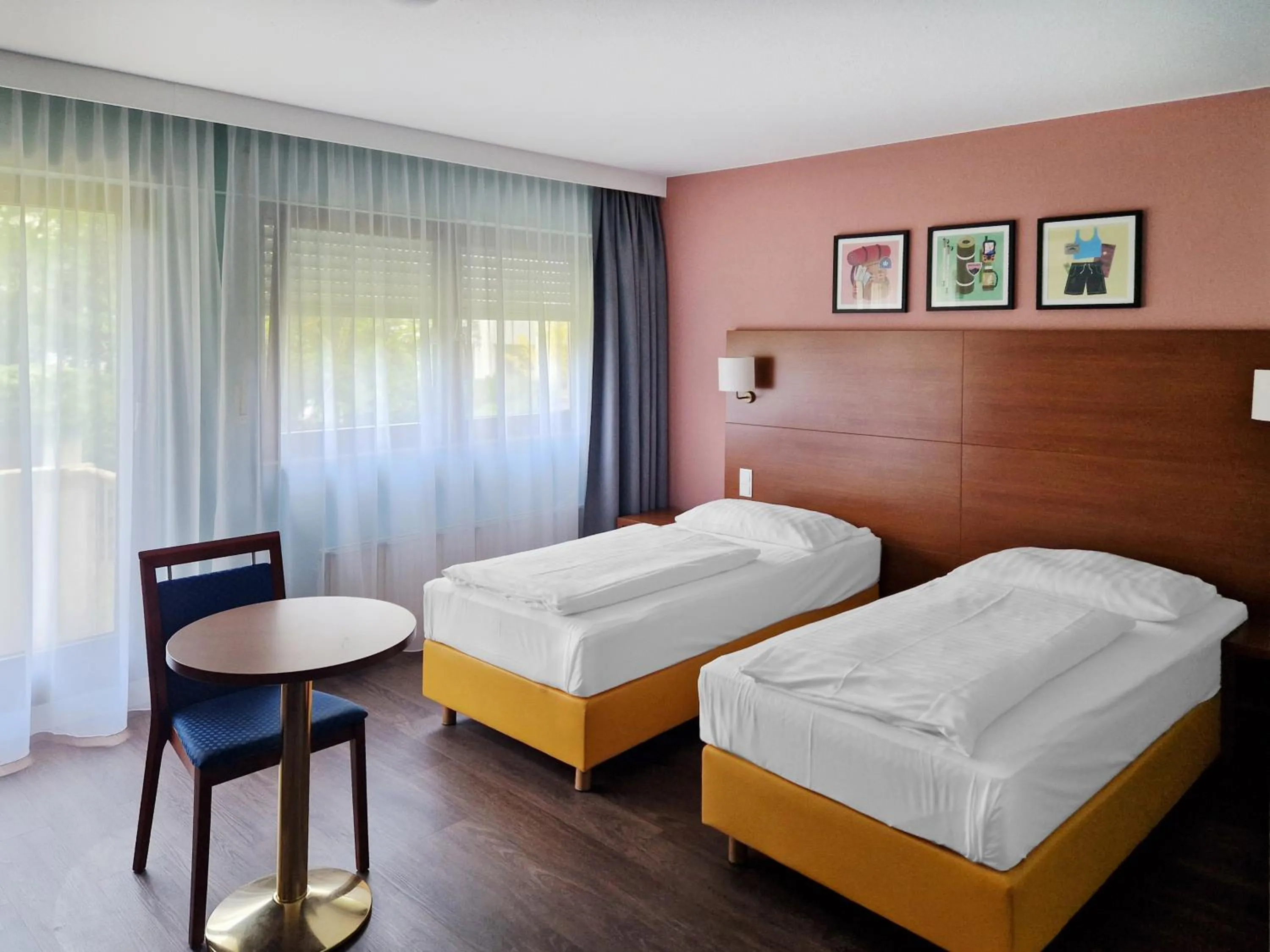 Bedroom, Bed in Hotel Rega Stuttgart