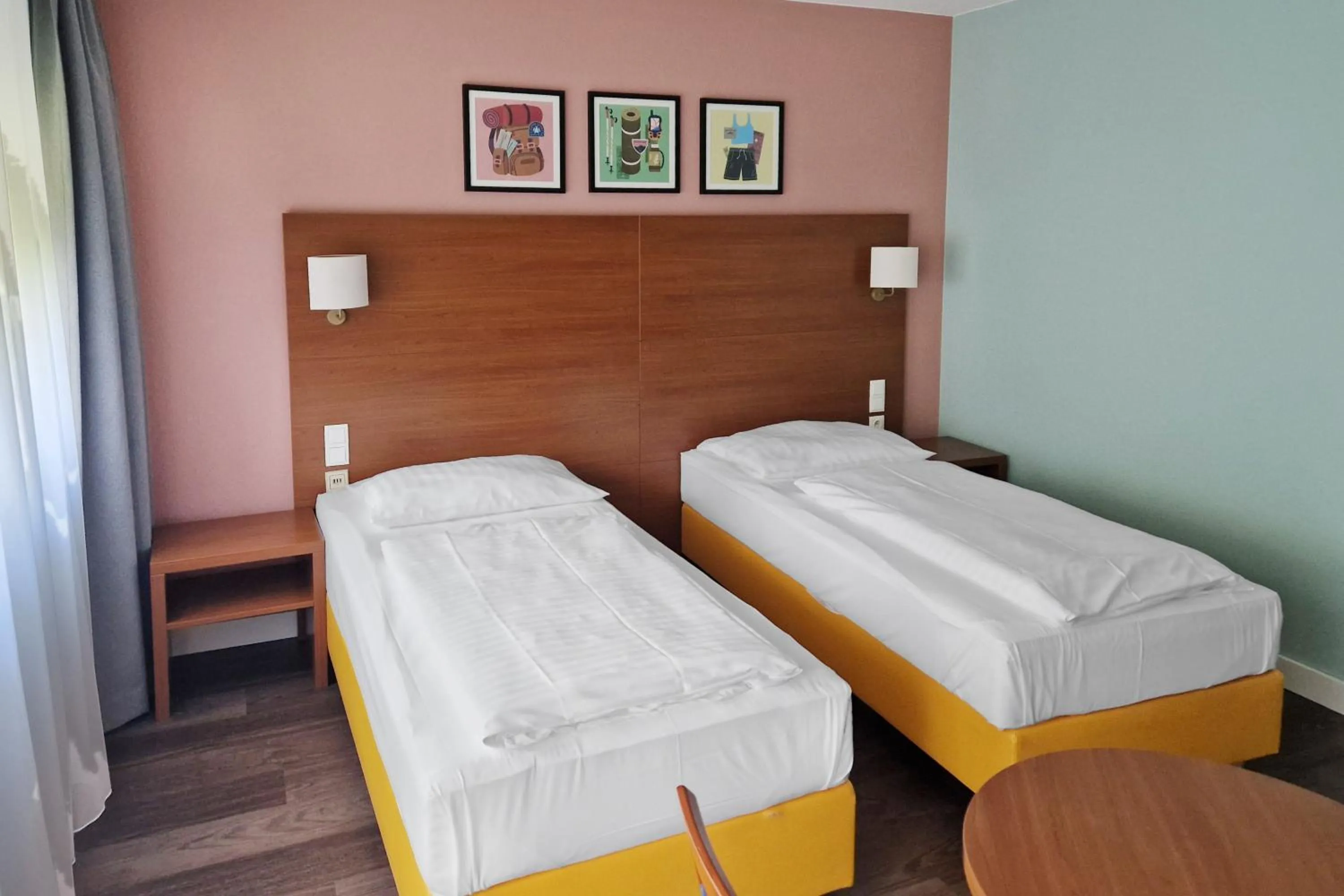 Photo of the whole room, Bed in Hotel Rega Stuttgart