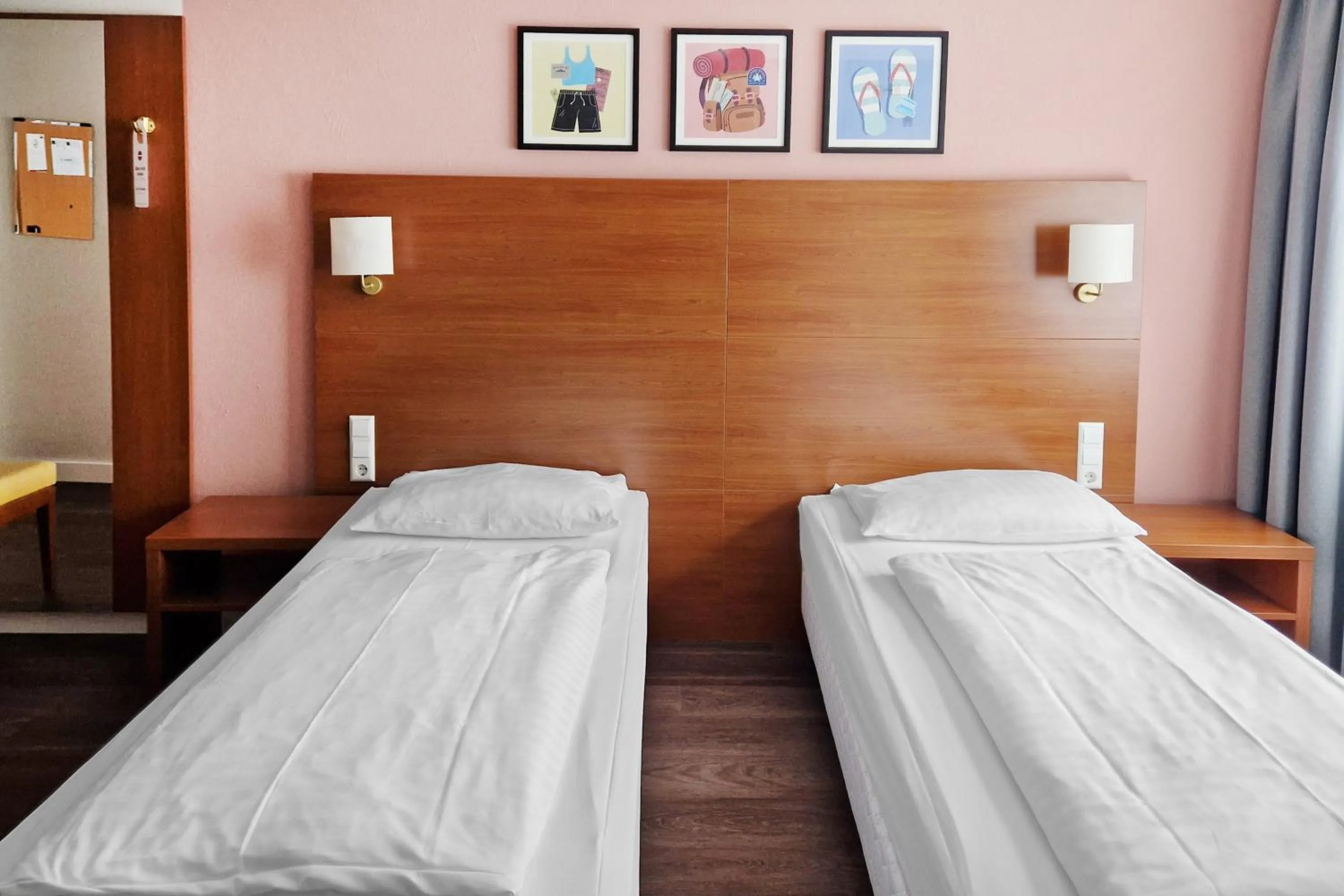 Photo of the whole room, Bed in Hotel Rega Stuttgart