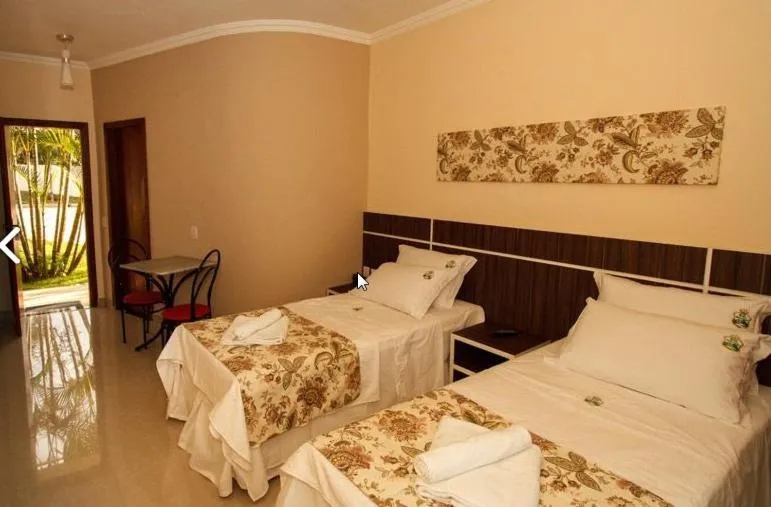 Photo of the whole room, Bed in Estrada Real Palace Hotel