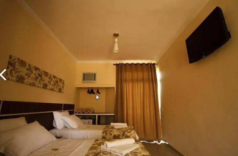 Photo of the whole room, Bed in Estrada Real Palace Hotel