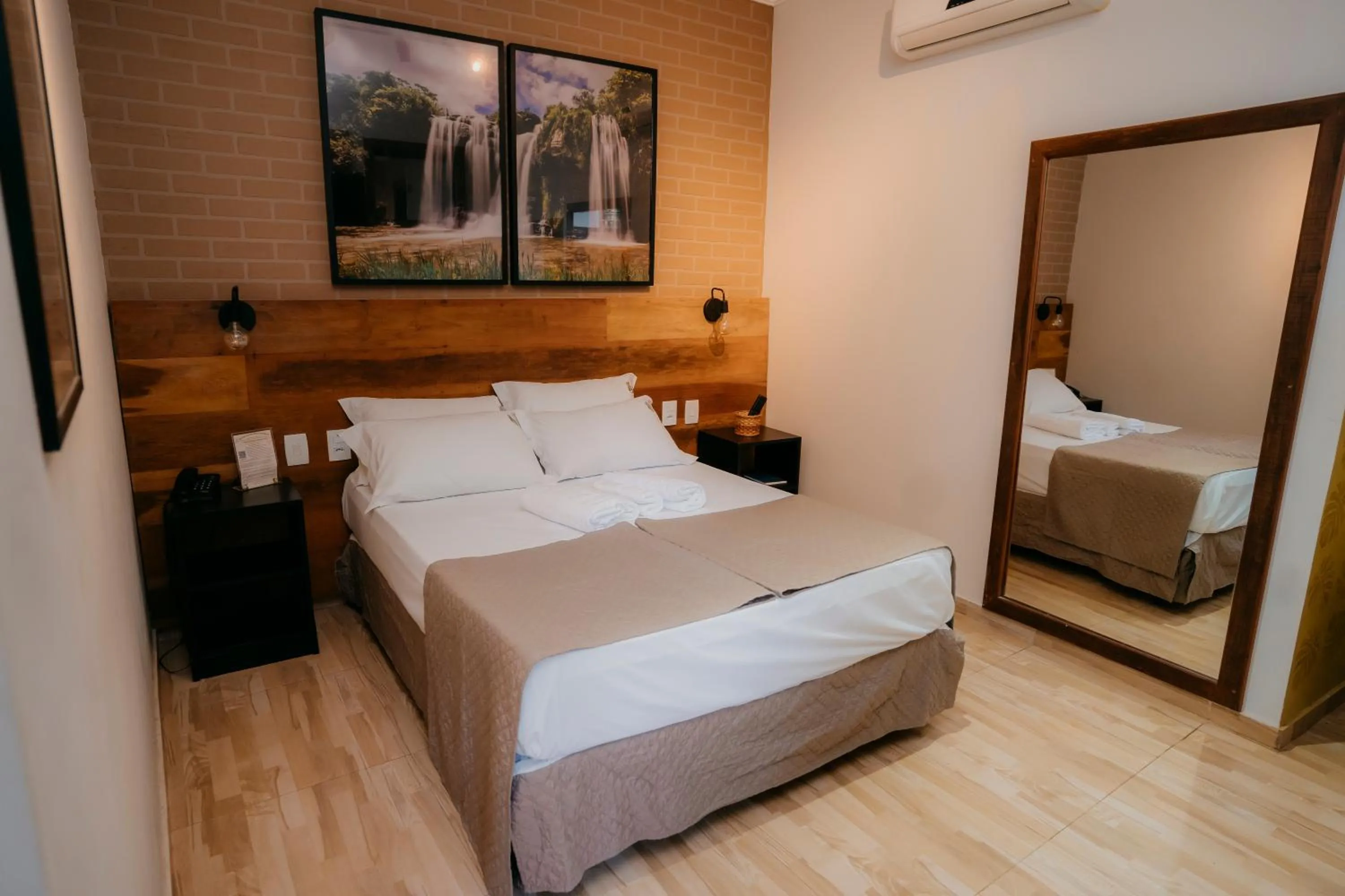 Bed in Estrada Real Palace Hotel