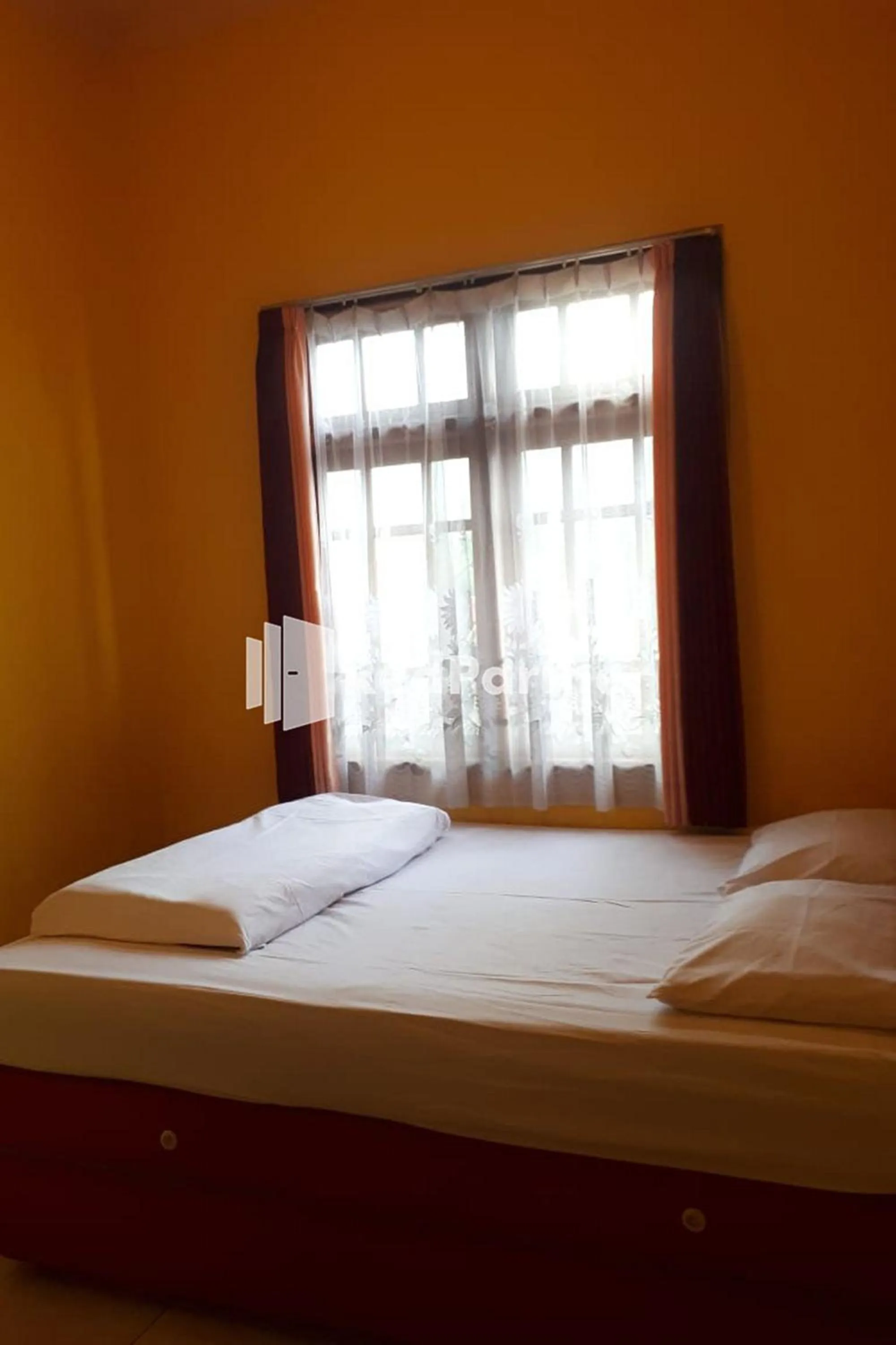 Bed in Bromo Indah Lestari Homestay Mitra RedDoorz