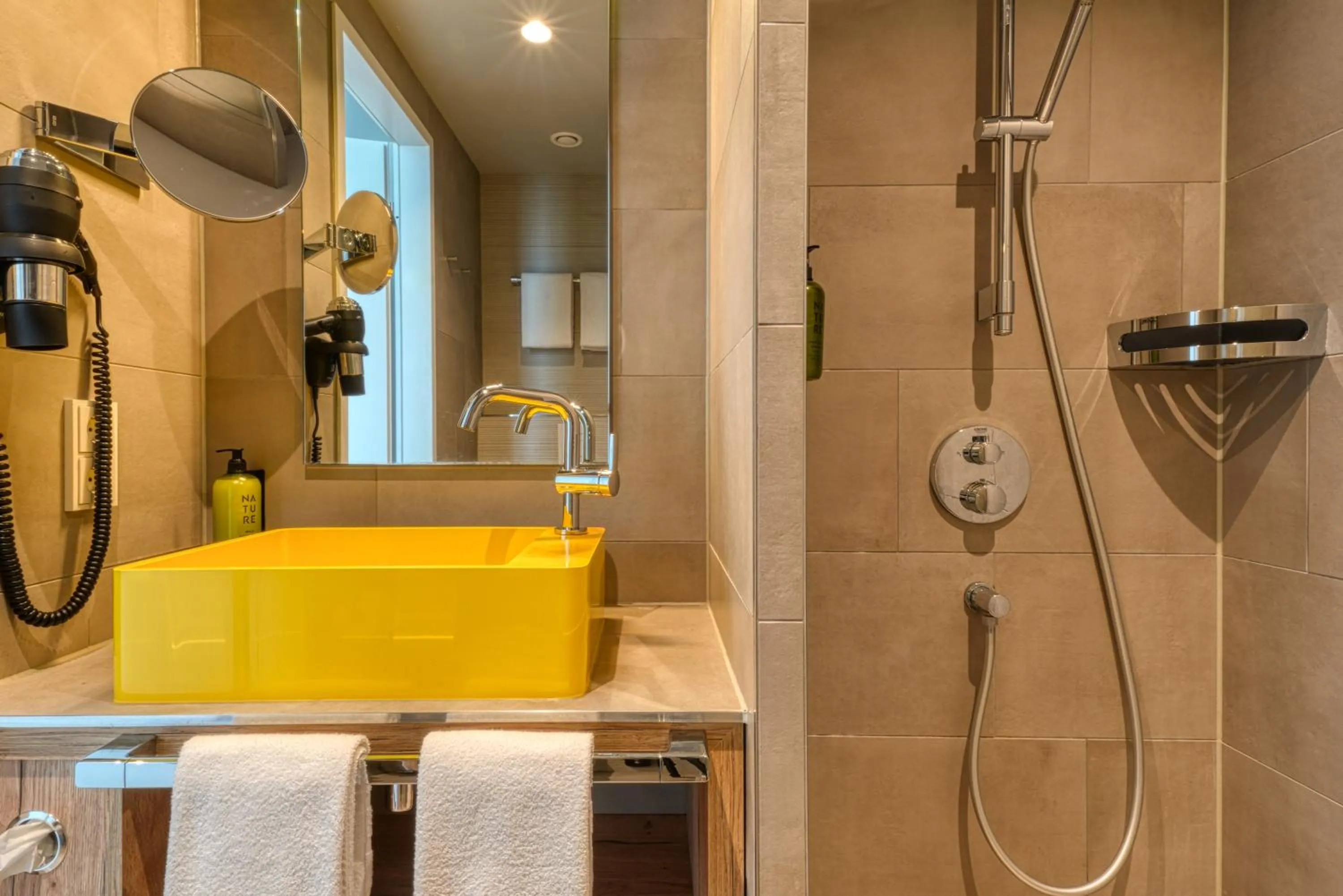 Bathroom in Vienna House Easy by Wyndham Hamburg Bergedorf