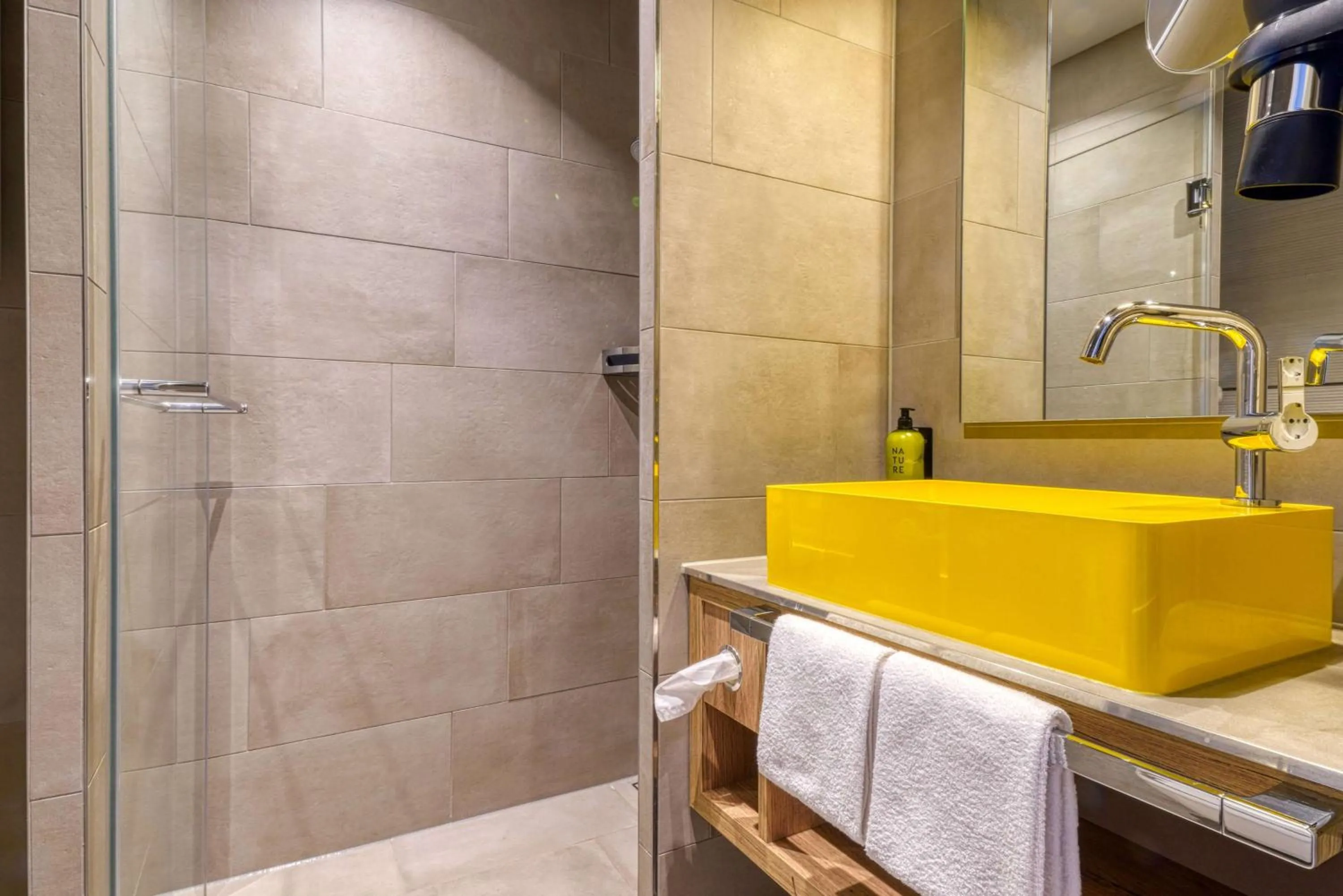 Bathroom in Vienna House Easy by Wyndham Hamburg Bergedorf