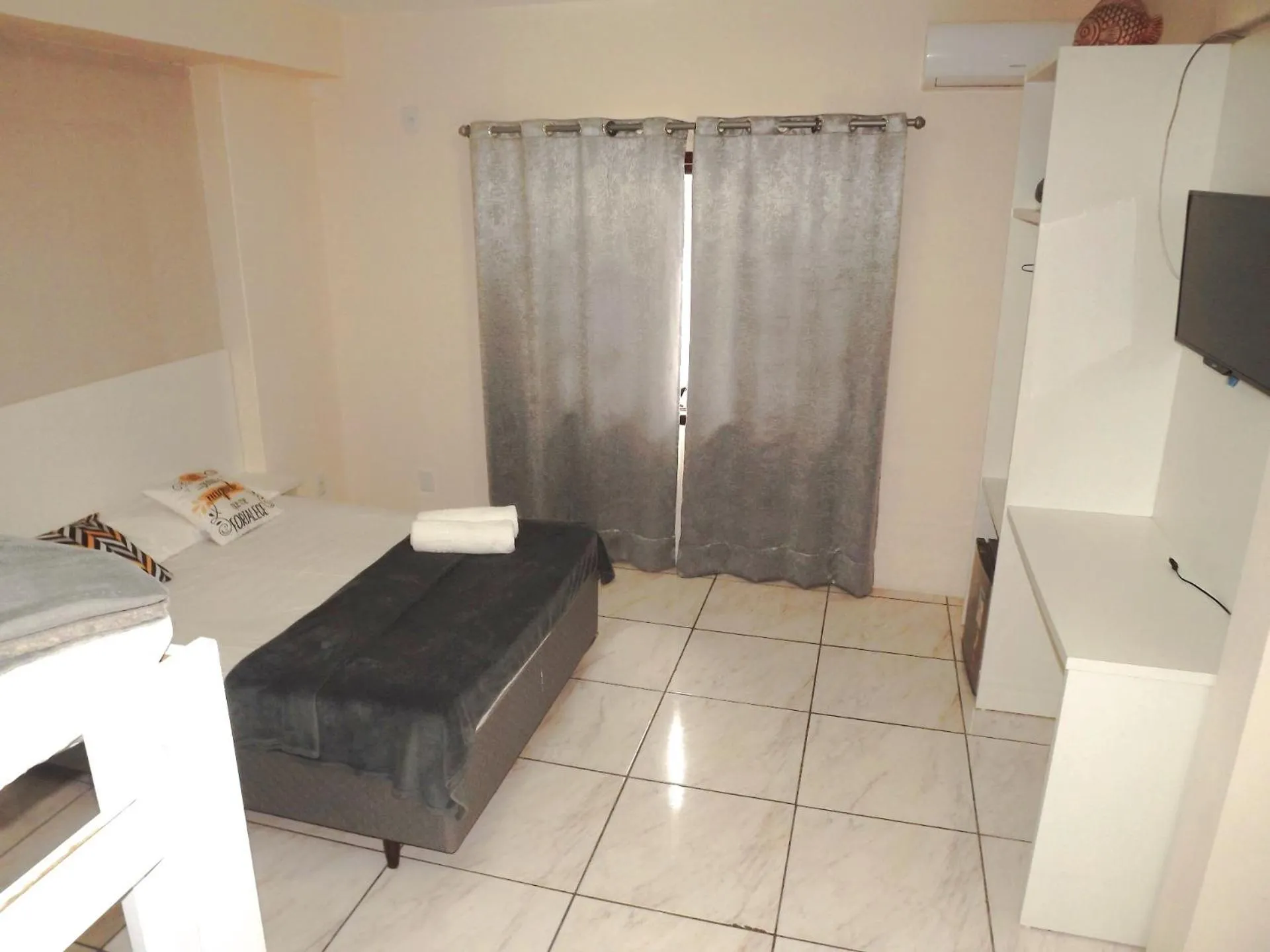 Bed in Pousada do Pescador