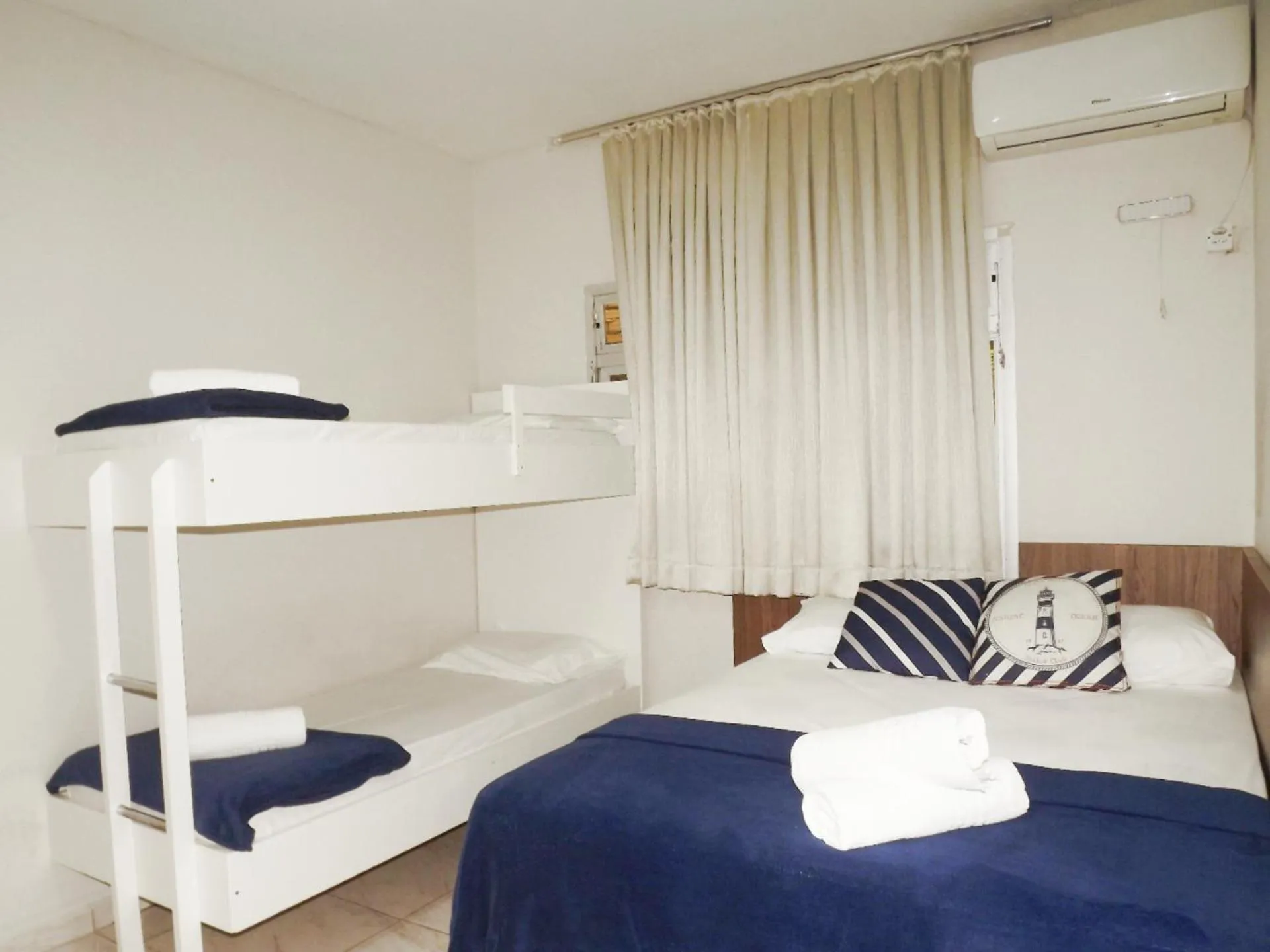 Bed in Pousada do Pescador