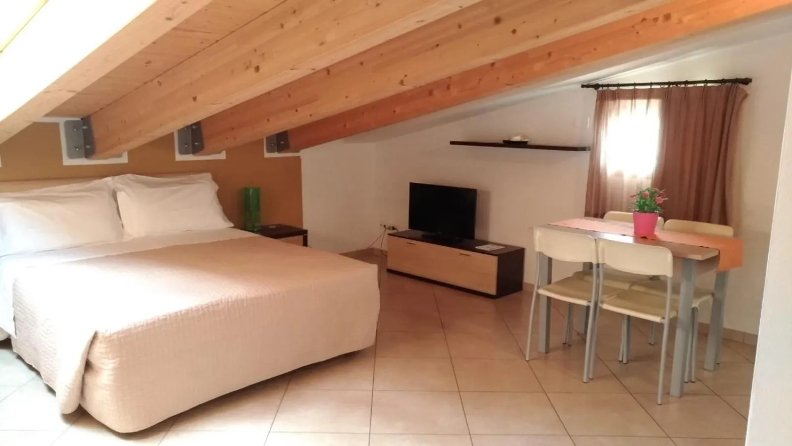 Bed in Residence Ilario Suite Hotel