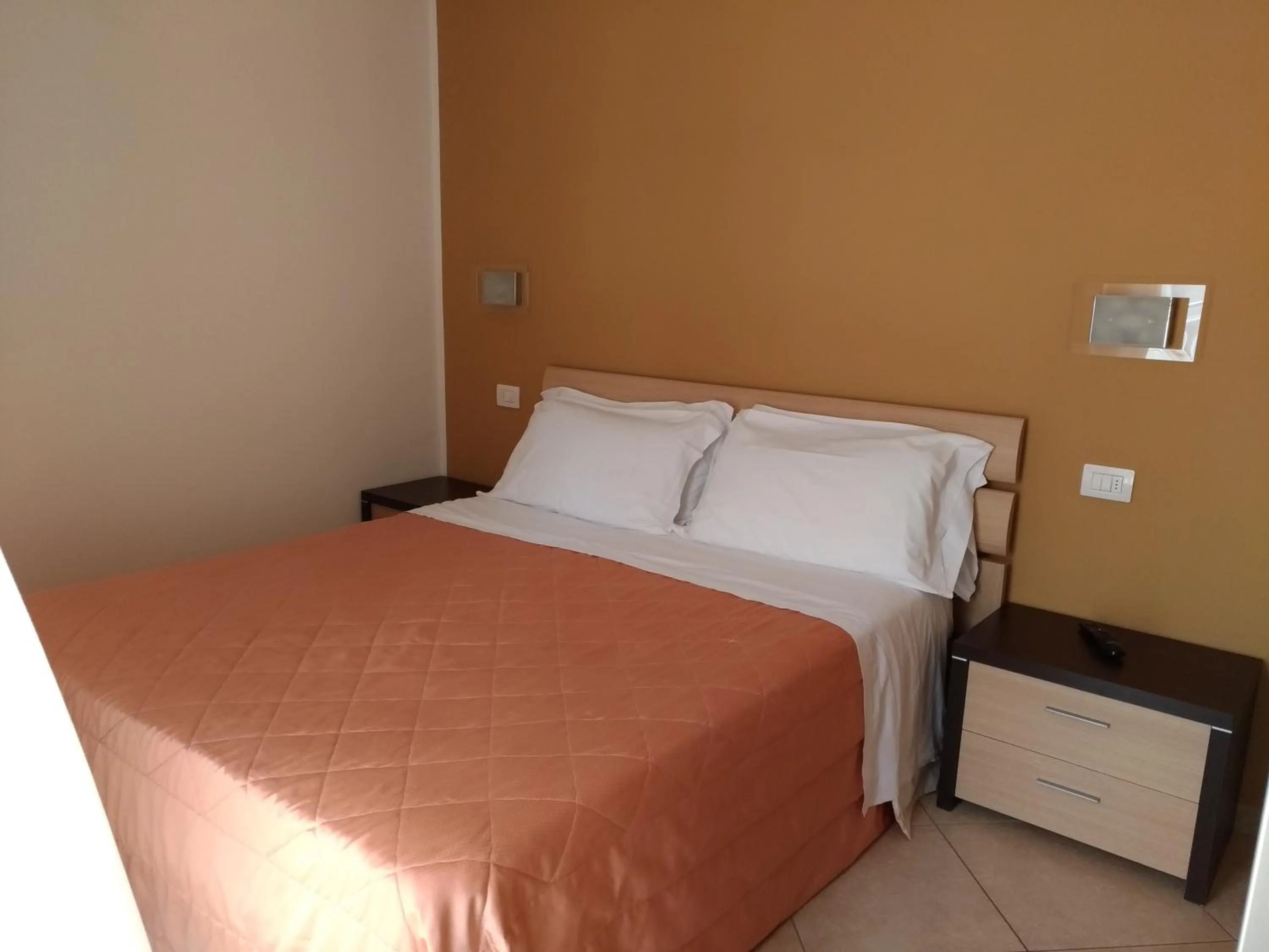 Bed in Residence Ilario Suite Hotel