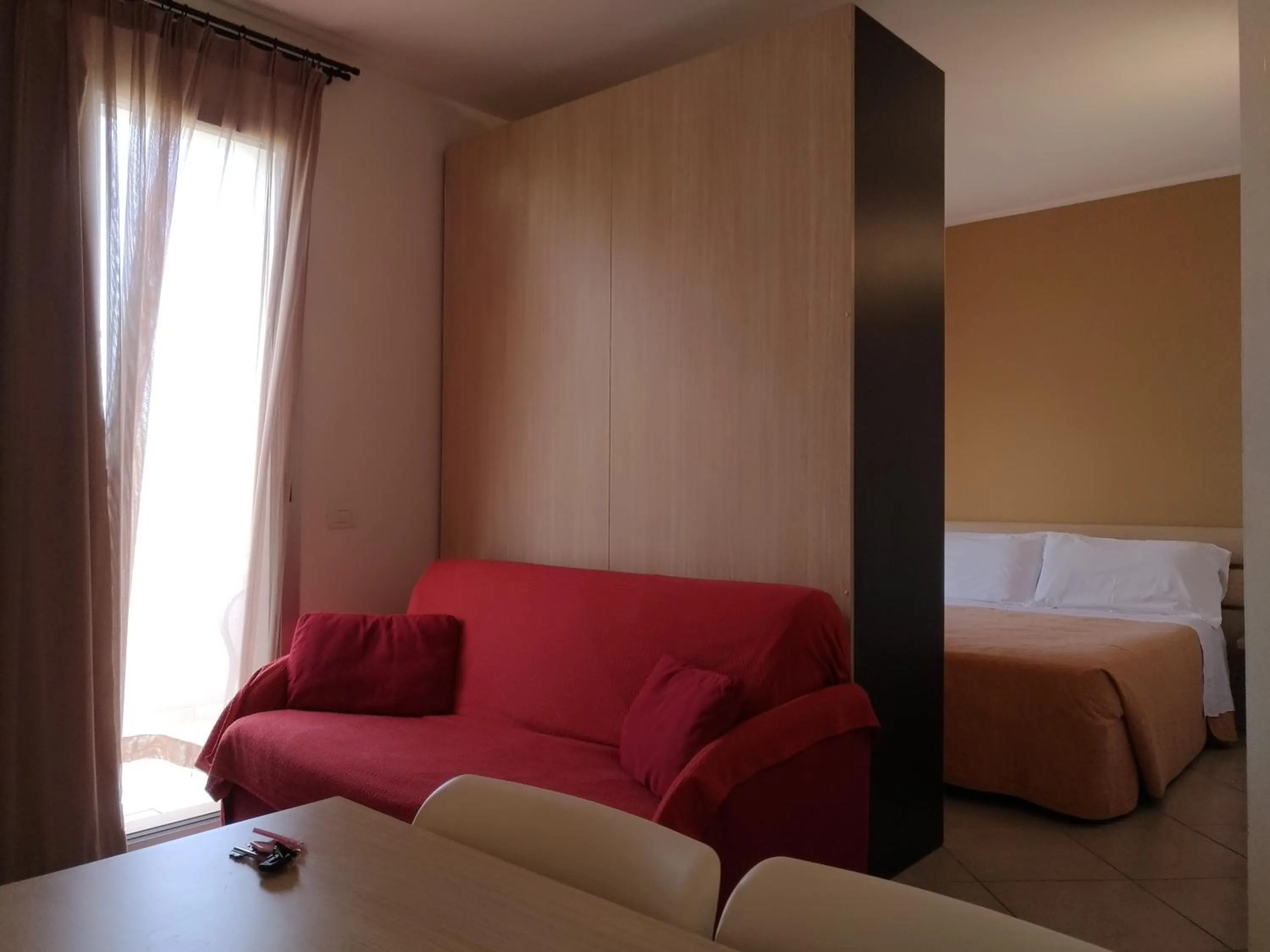 Bed in Residence Ilario Suite Hotel