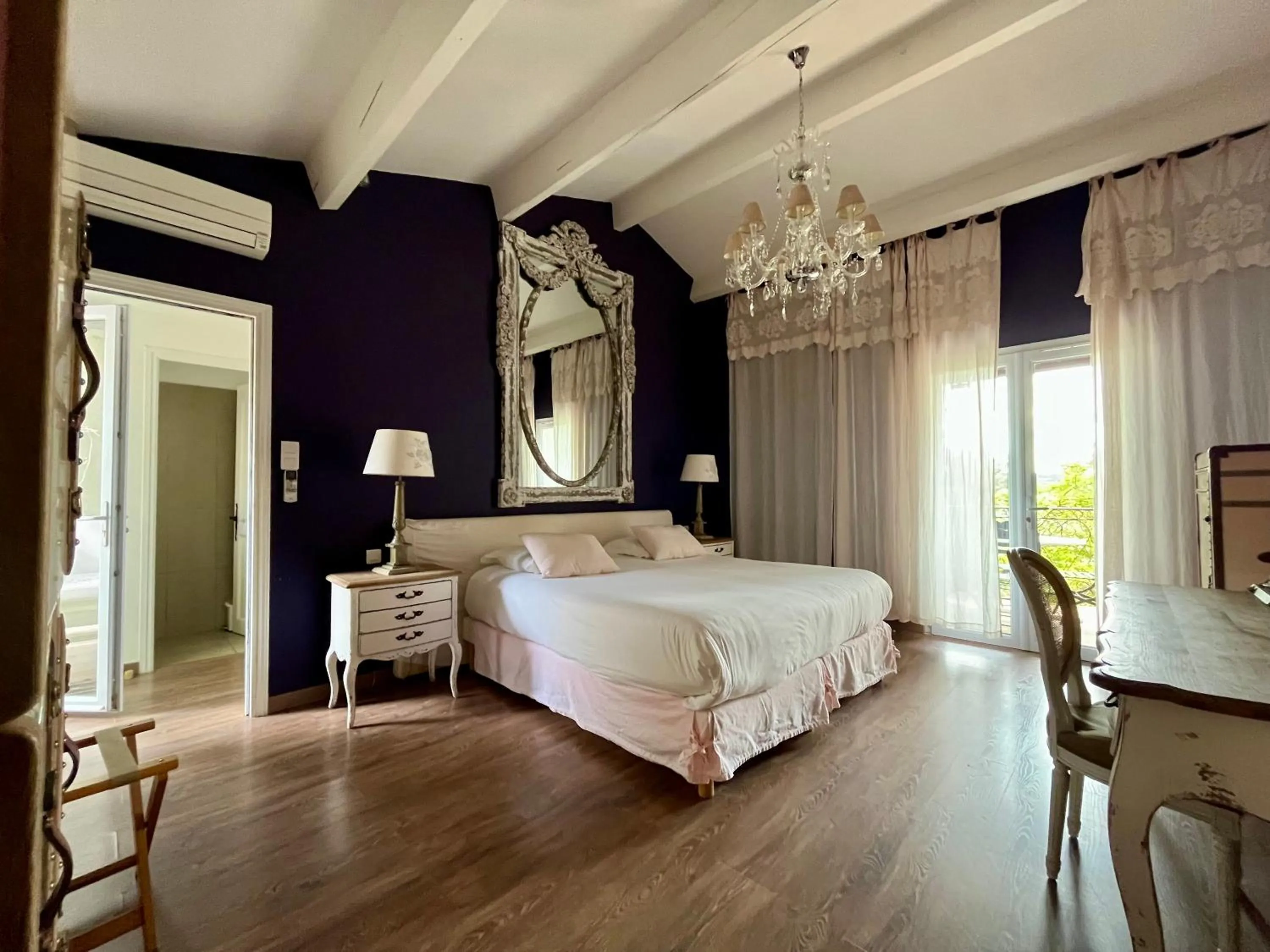 Bed in Logis Hôtel restaurant des Pins