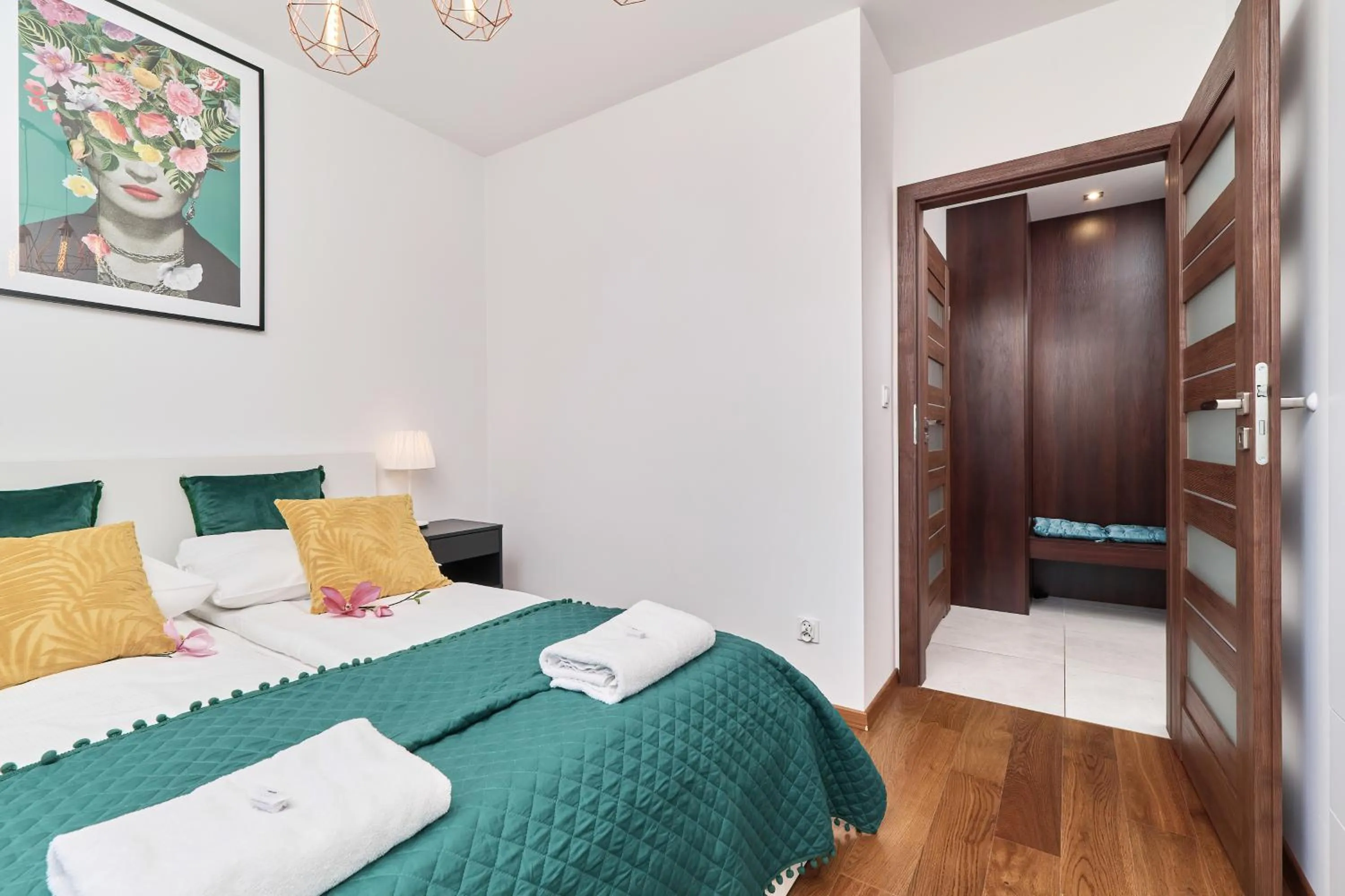 Bed in Nowa Tęczowa Apartments Promenada Staromiejska by Noclegi Renters