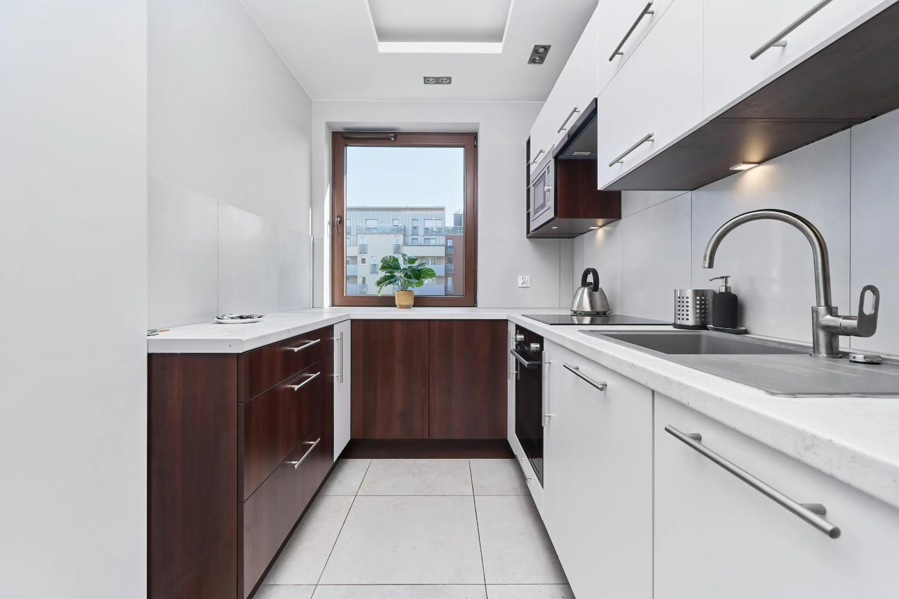 Kitchen or kitchenette in Nowa Tęczowa Apartments Promenada Staromiejska by Noclegi Renters