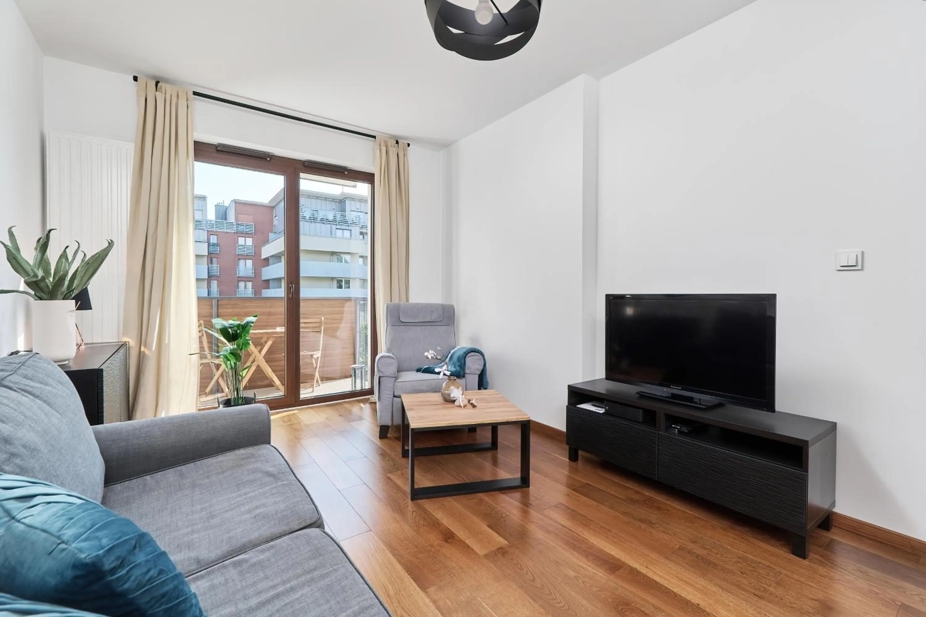 TV and multimedia in Nowa Tęczowa Apartments Promenada Staromiejska by Noclegi Renters