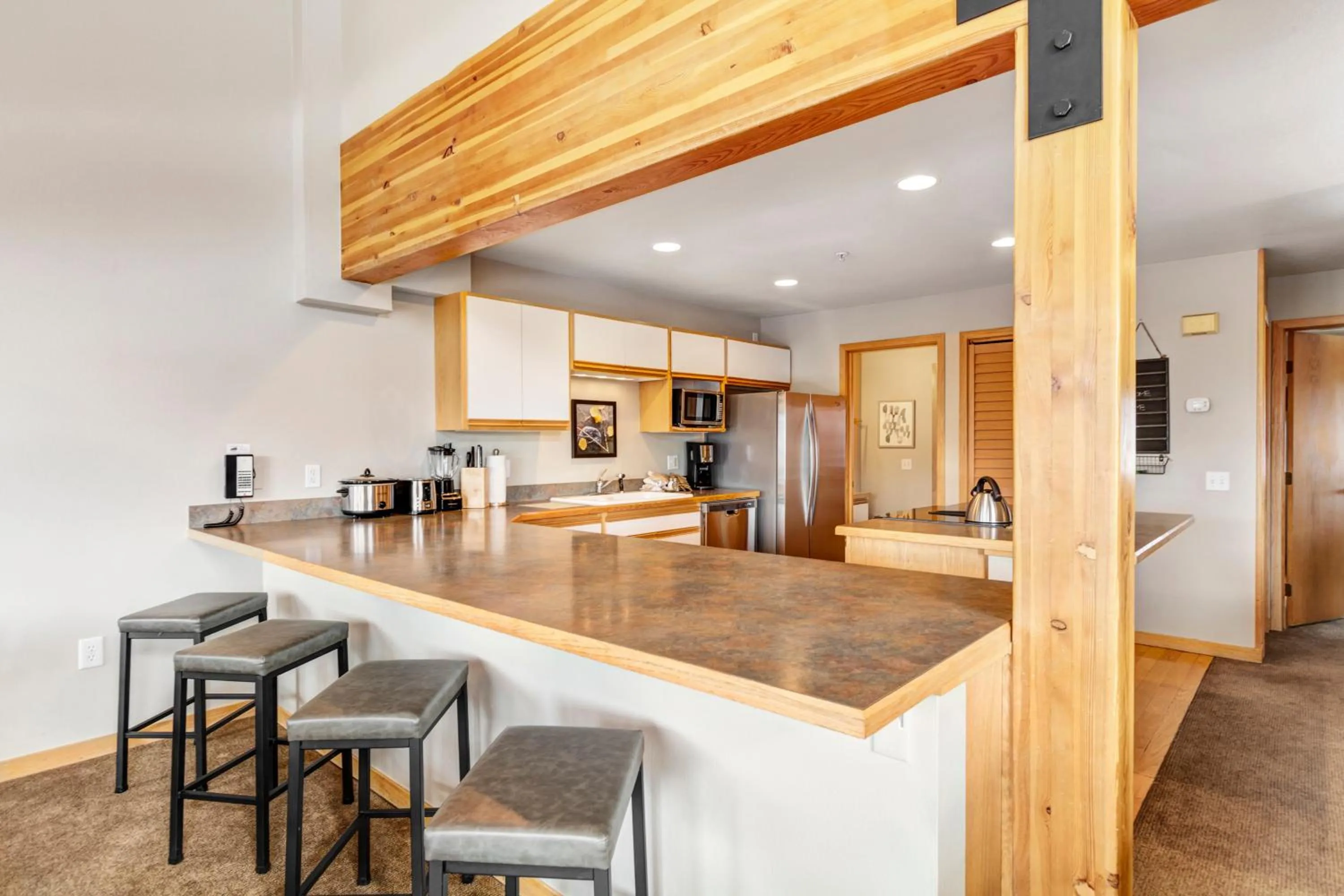 Kitchen or kitchenette in Gold Point Resort Breckenridge by Vacatia