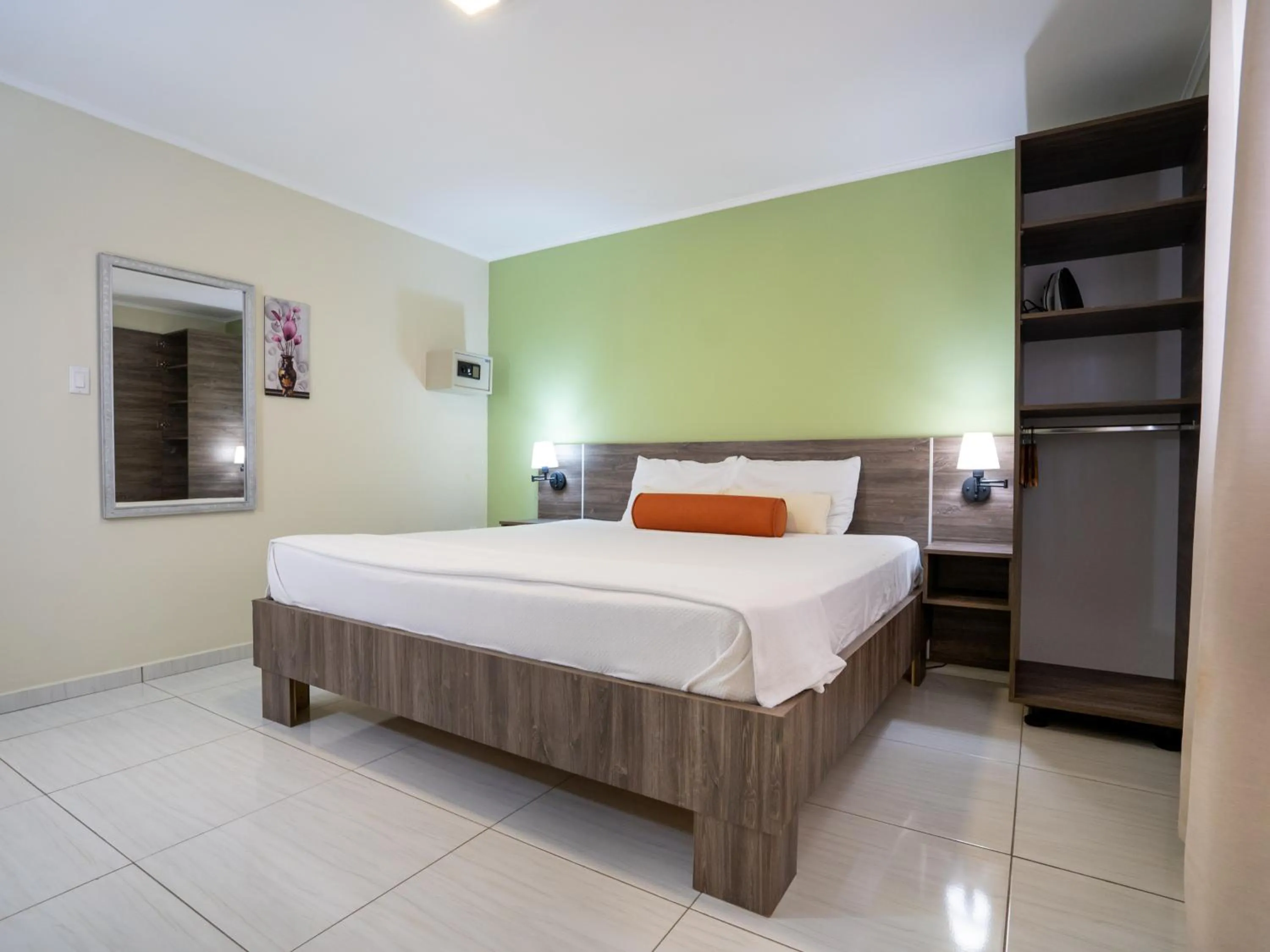 Bed in Delynne Boutique Hotel