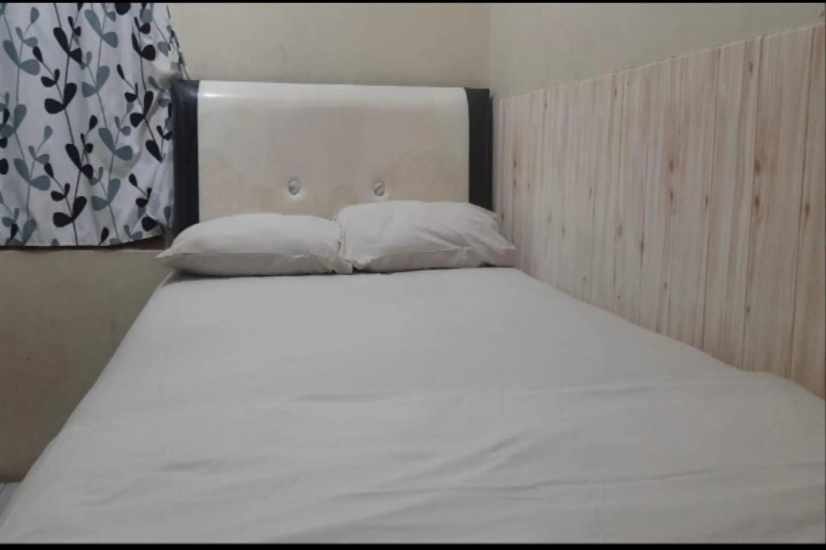 Bedroom in OYO 90706 Kost Alam Jaya Syariah