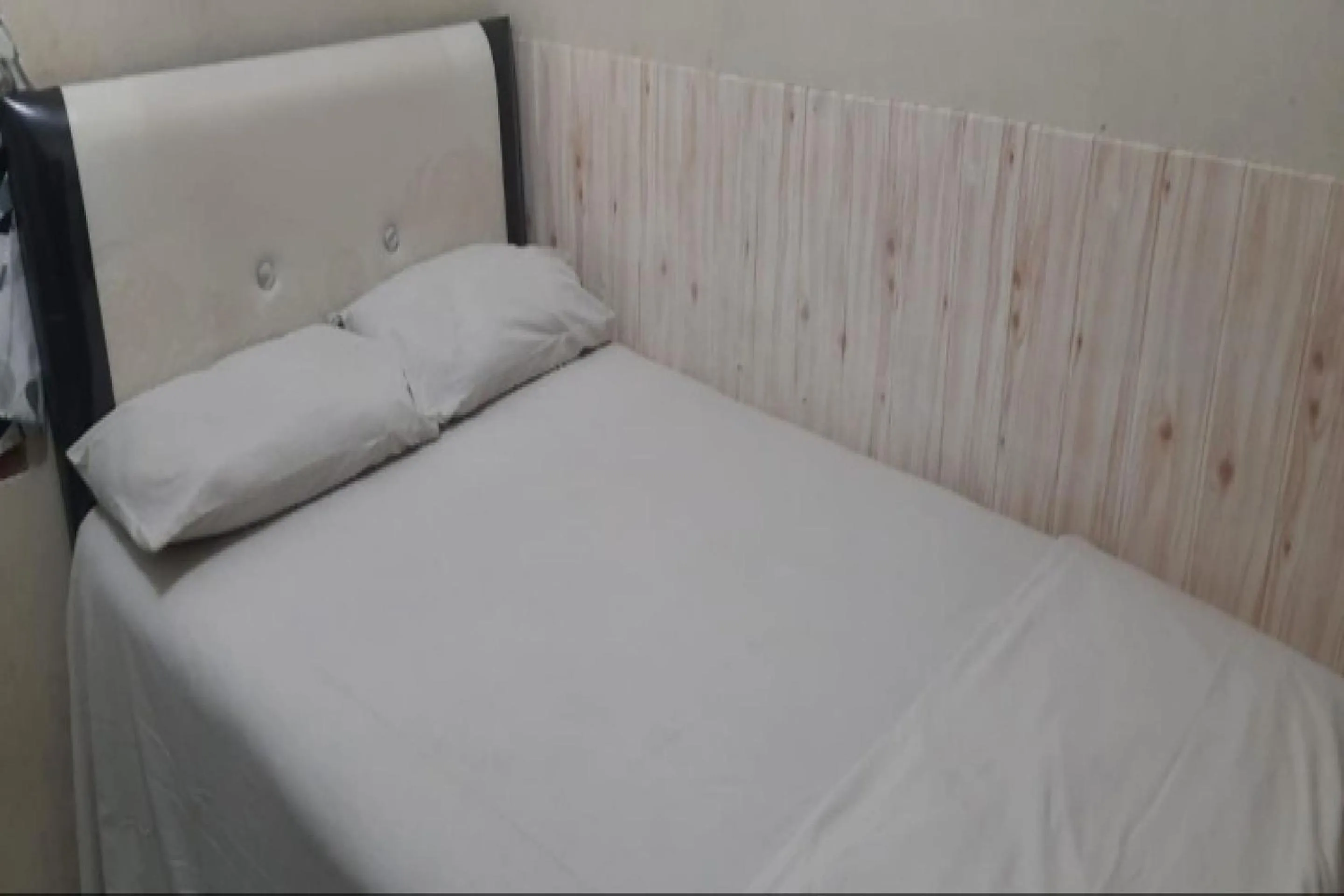 Bedroom in OYO 90706 Kost Alam Jaya Syariah