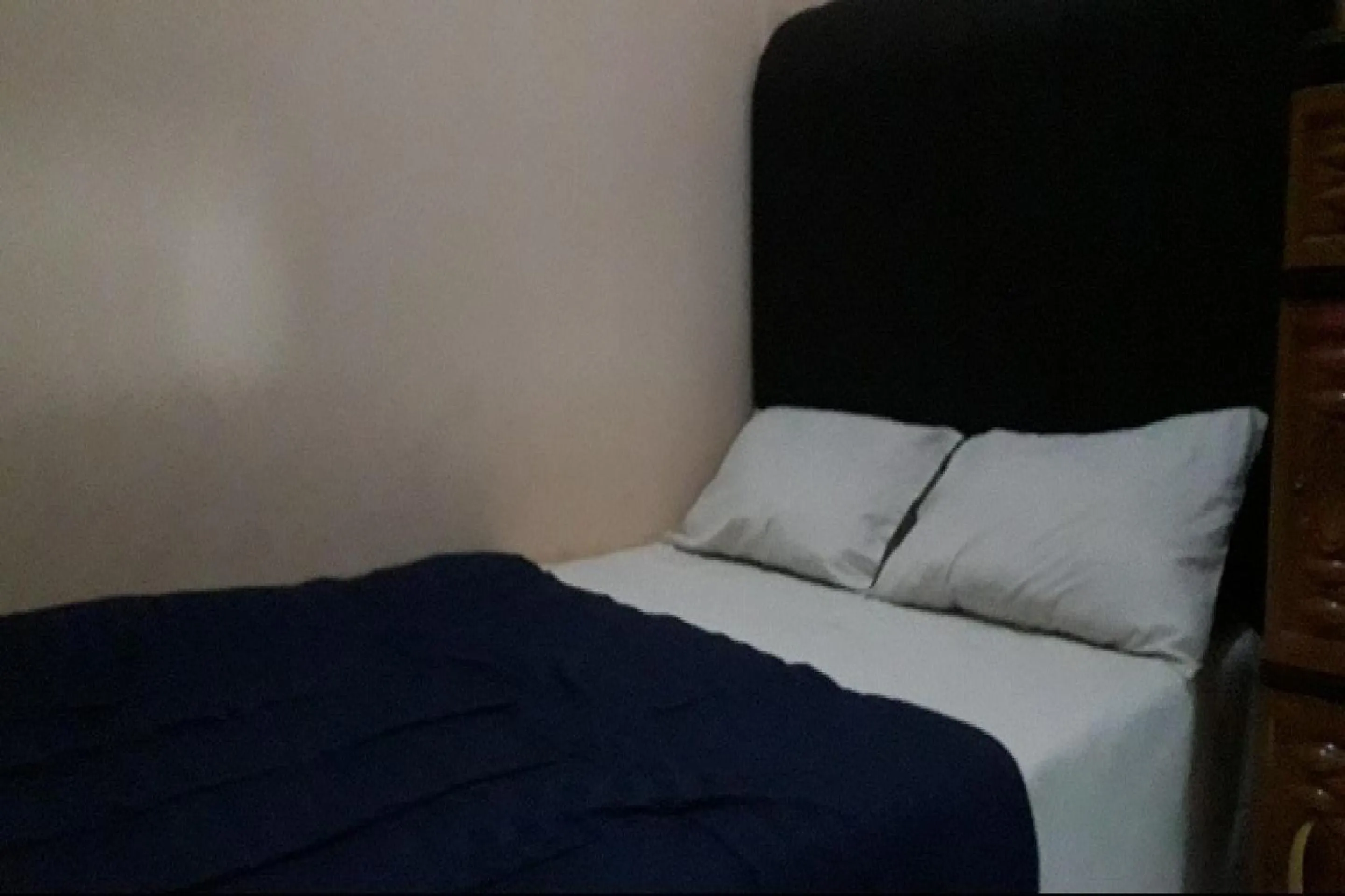 Bedroom in OYO 90706 Kost Alam Jaya Syariah