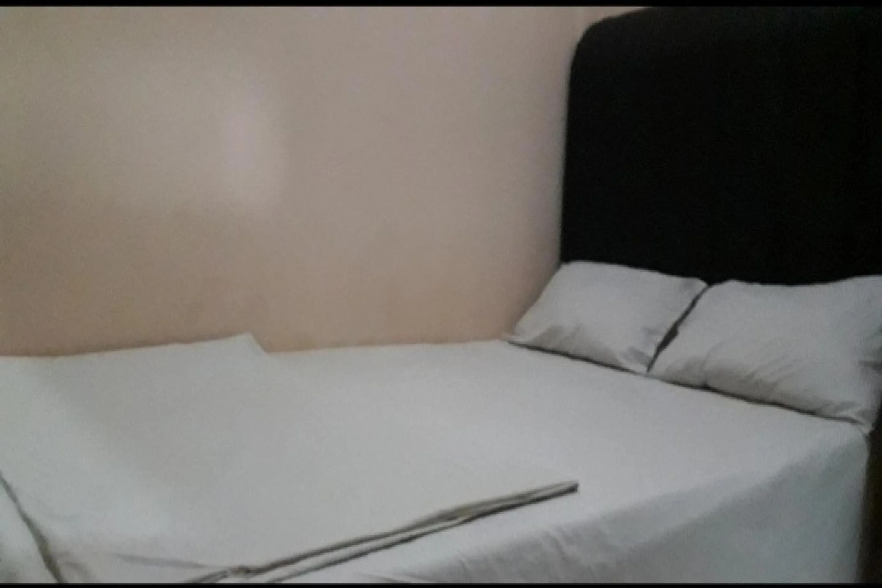 Bedroom in OYO 90706 Kost Alam Jaya Syariah