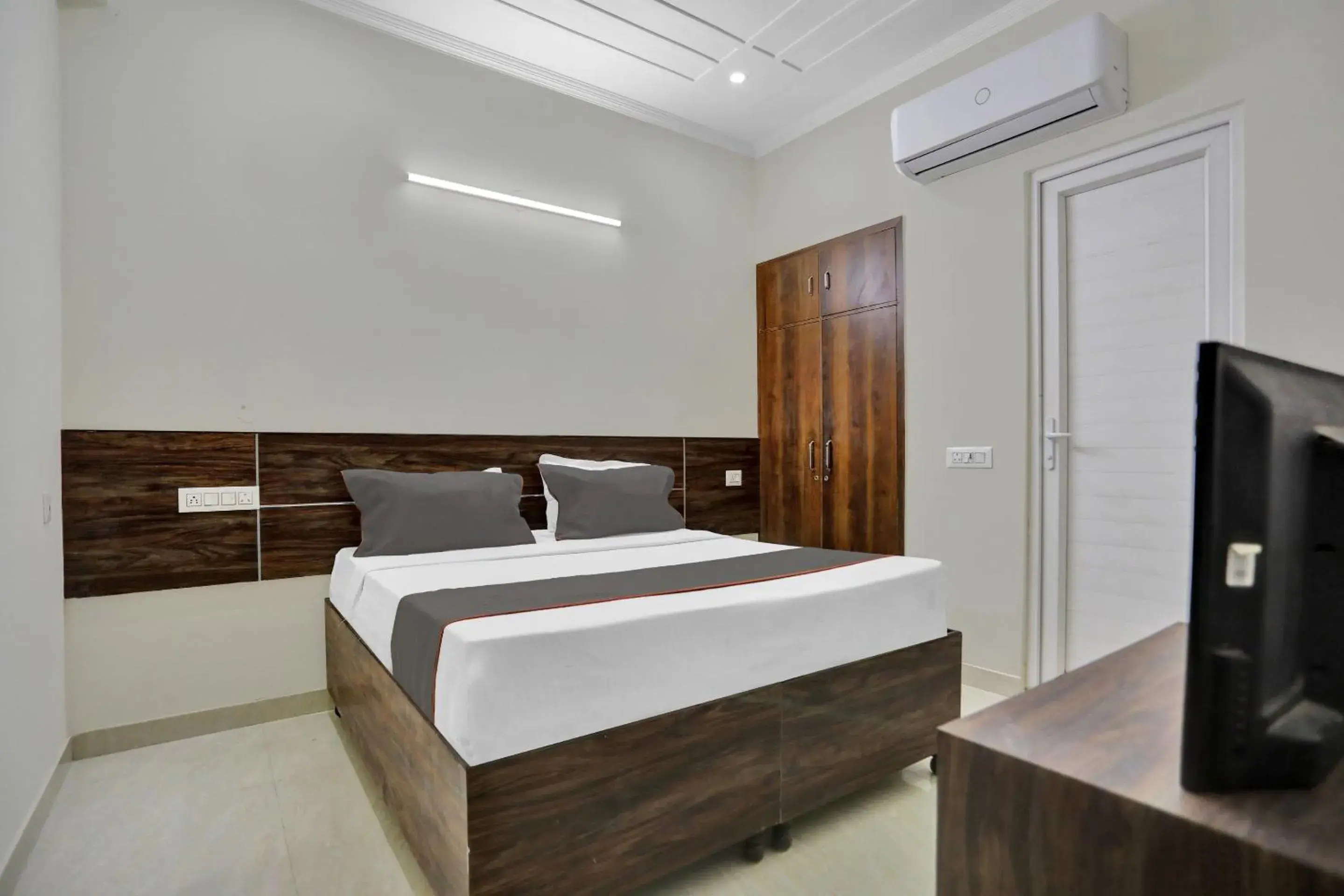 Classic Triple Room - single occupancy in Collection O Raksha Inn Near PVR Ansal Plaza Greater Noida Classic Triple Room - single occupancy in Collection O Raksha Inn Near PVR Ansal Plaza Greater Noida