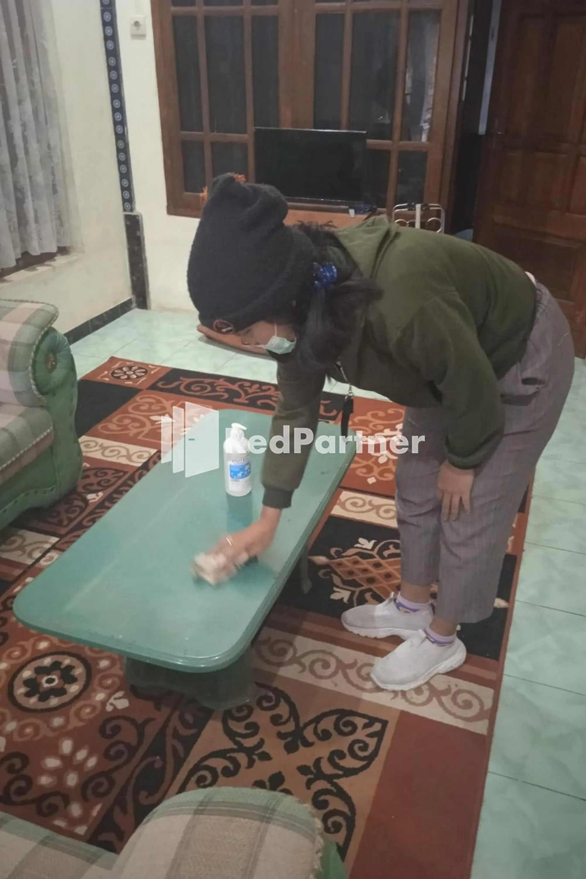 Staff in Gebby Homestay Bromo RedPartner